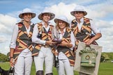 7th Heritage Polo Cup finals: Ladies of the British Empire holding the Ladies HERITAGE POLO CUP 2012 ltr Sarah Wisman, Leigh Fisher, Charlie Howel, Rosie Ross..
Hurtwood Park Polo Club,
Ewhurst Green,
Surrey,
United Kingdom,
on 05 August 2012 at 17:04, image #262