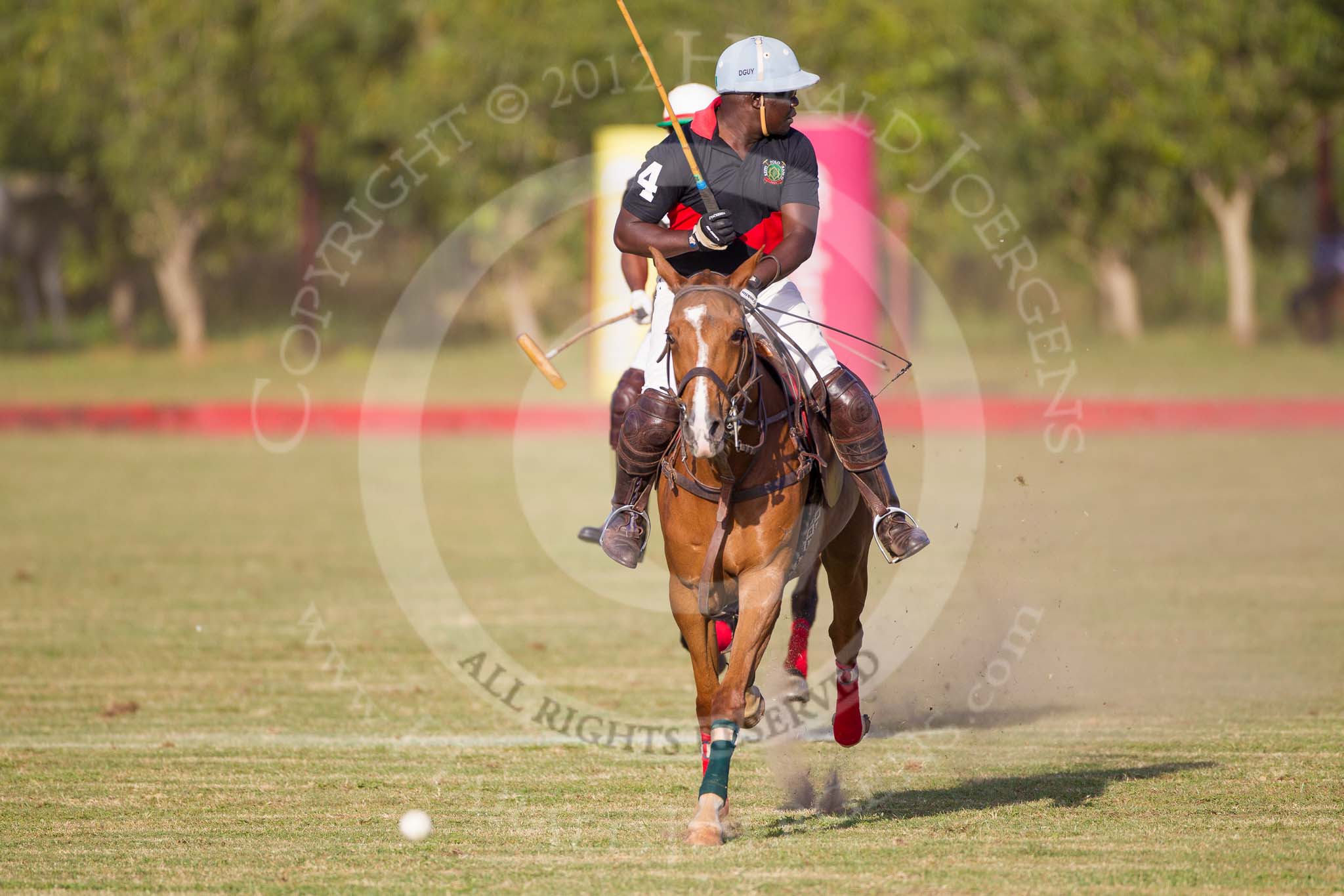 African Patrons Cup 2012 (Friday): Match Access Bank Fifth Chukker v Keffi Ponies: Ibrahim 'Rambo' Mohammed and Hon. Ahmed Aliyu Wadada behind..
Fifth Chukker Polo & Country Club,
Kaduna,
Kaduna State,
Nigeria,
on 02 November 2012 at 16:38, image #80