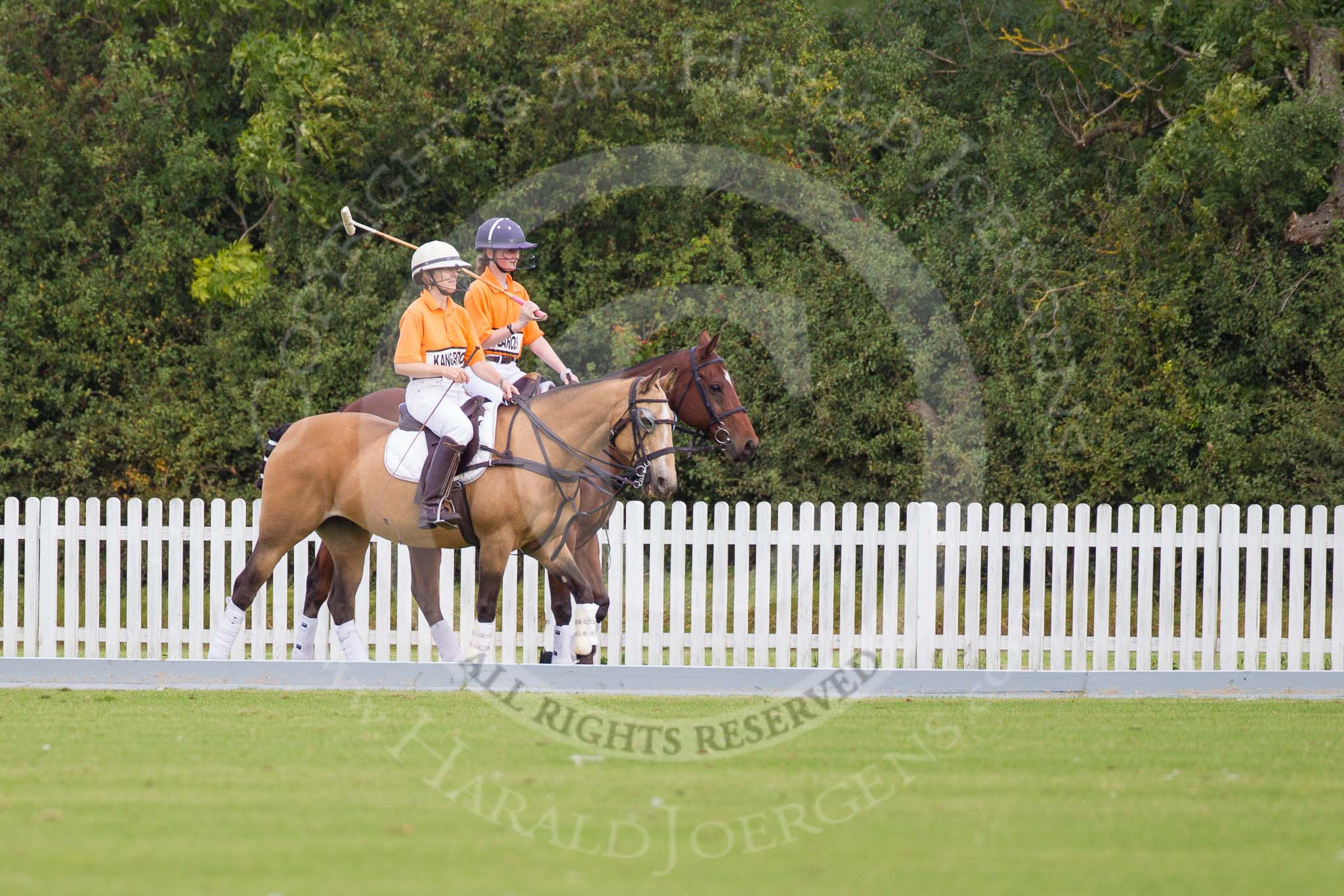 Photo 1209161003381D44639HaraldJoergens DBPC Polo in the Park 2012: Getting ready for the first match - Kangaroos team players Jane Kang and Amy Harper..
Dallas Burston Polo Club,
Stoneythorpe Estate,
Southam,
Warwickshire,
United Kingdom,
on 16 September 2012 at 10:03, image #26