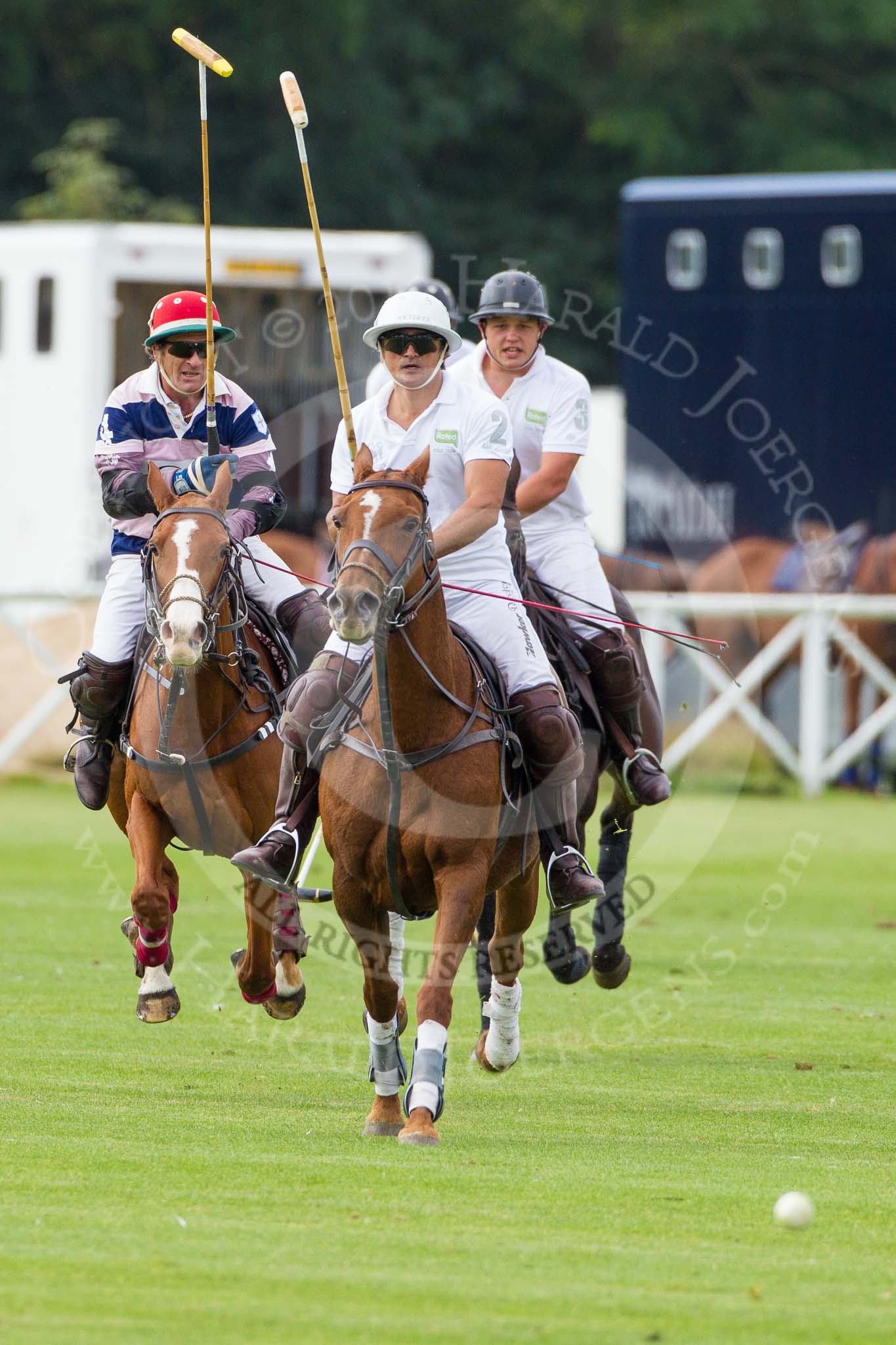 DBPC Polo in the Park 2012: JCS Polo team #4, Sebastian Funes, Rated People #2, Tariq Dag Khan, and #3, Alex Vent..
Dallas Burston Polo Club,
Stoneythorpe Estate,
Southam,
Warwickshire,
United Kingdom,
on 16 September 2012 at 11:14, image #77