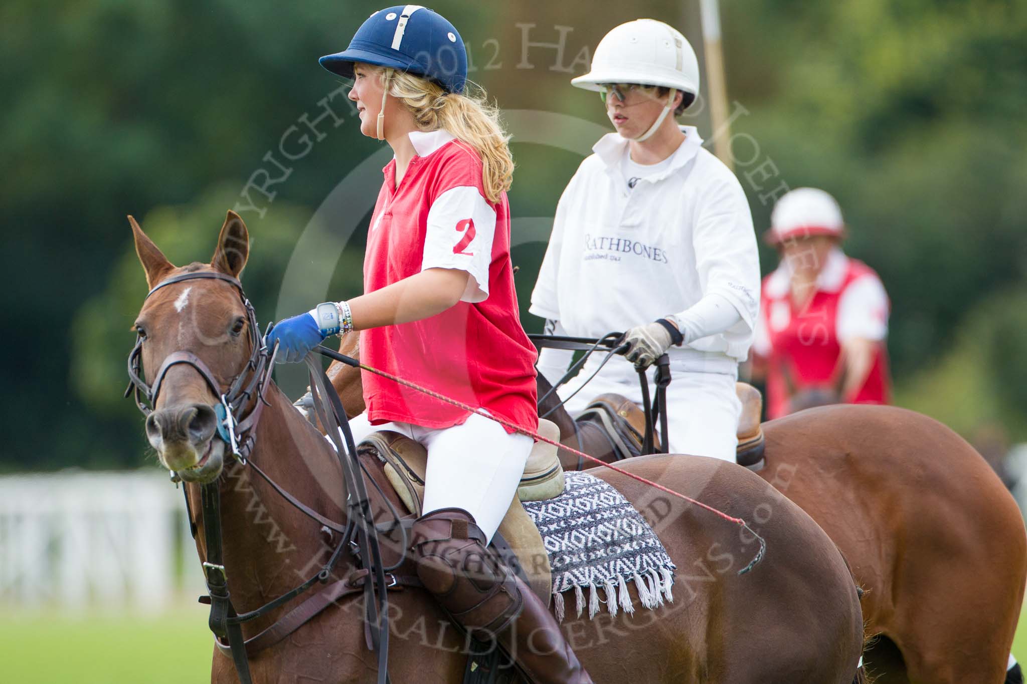 DBPC Polo in the Park 2012: Phoenix Polo Team #2, Jeanette Jones, and Rathbones Polo Team #2, Alex Boucher..
Dallas Burston Polo Club,
Stoneythorpe Estate,
Southam,
Warwickshire,
United Kingdom,
on 16 September 2012 at 11:39, image #95