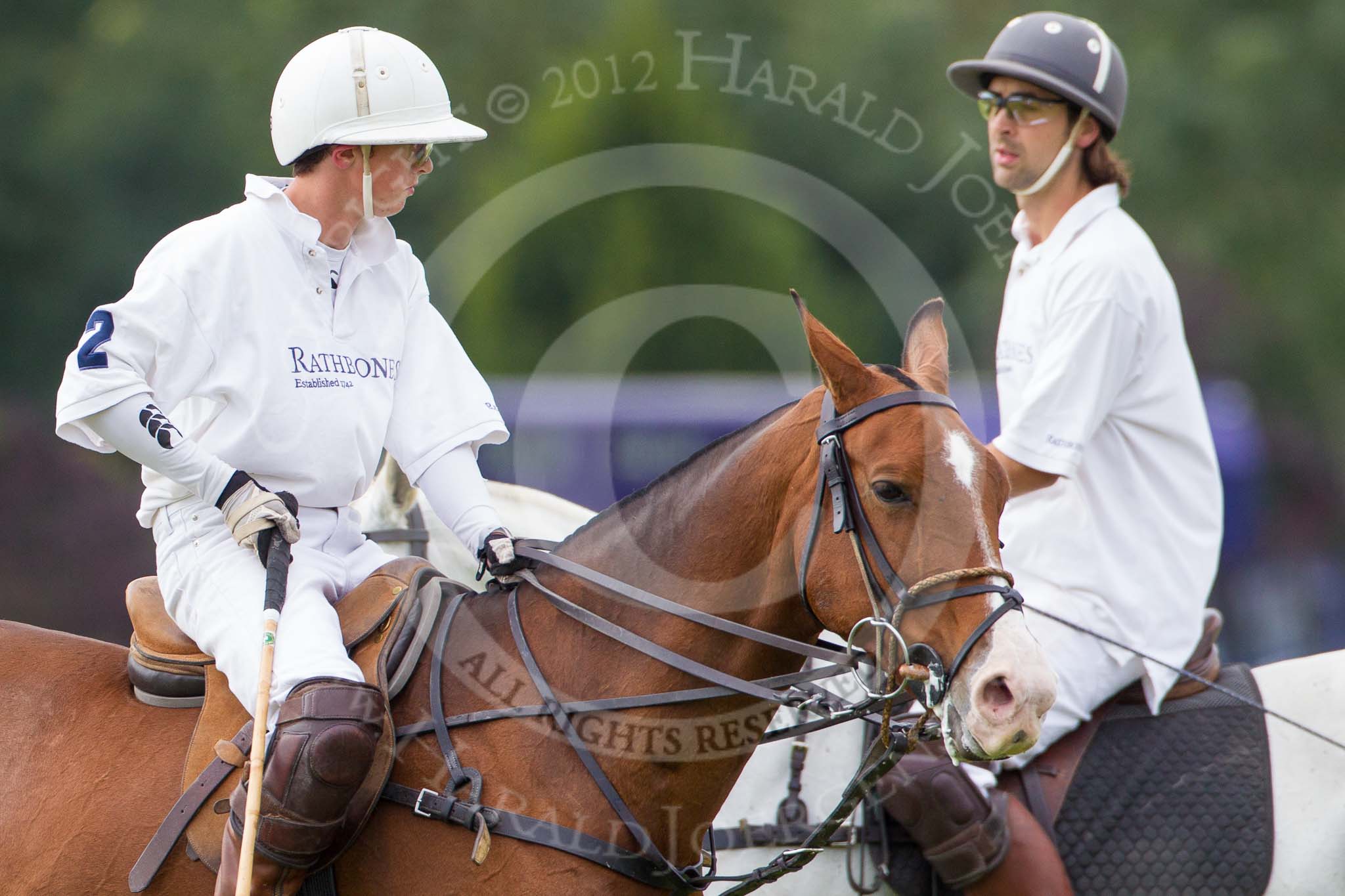 DBPC Polo in the Park 2012: Rathbones Polo Team #2, Alex Boucher, and #3, Tom Gilks..
Dallas Burston Polo Club,
Stoneythorpe Estate,
Southam,
Warwickshire,
United Kingdom,
on 16 September 2012 at 11:43, image #98