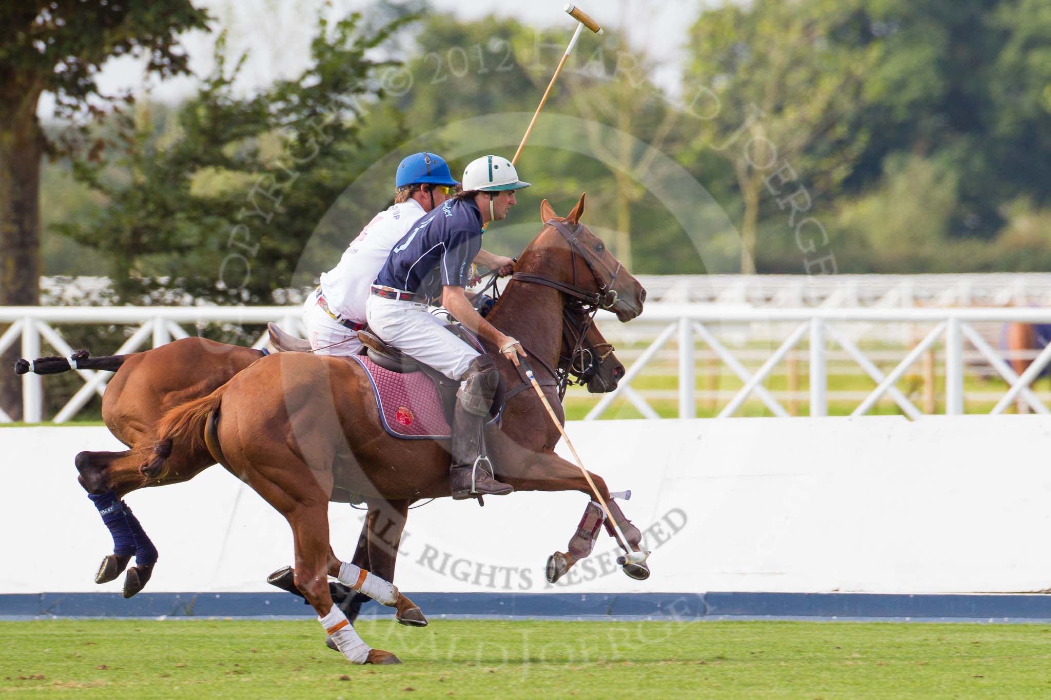 DBPC Polo in the Park 2012: Quicksilver Polo Team #3, Philip Baker, and Dawson Group Polo Team #4, David Ashby..
Dallas Burston Polo Club,
Stoneythorpe Estate,
Southam,
Warwickshire,
United Kingdom,
on 16 September 2012 at 12:55, image #134