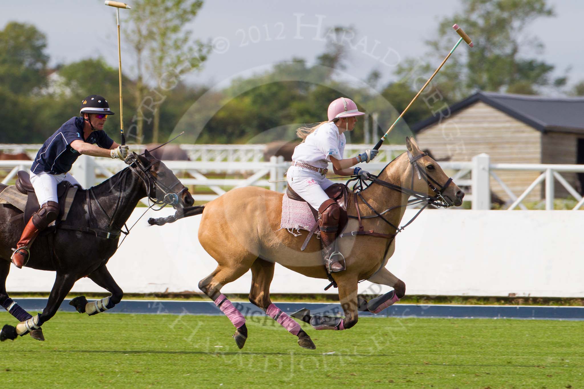 DBPC Polo in the Park 2012: Quicksilver Polo Team #1, Peter Ferrari, and Dawson Group #1, Freya Dawson..
Dallas Burston Polo Club,
Stoneythorpe Estate,
Southam,
Warwickshire,
United Kingdom,
on 16 September 2012 at 13:10, image #140