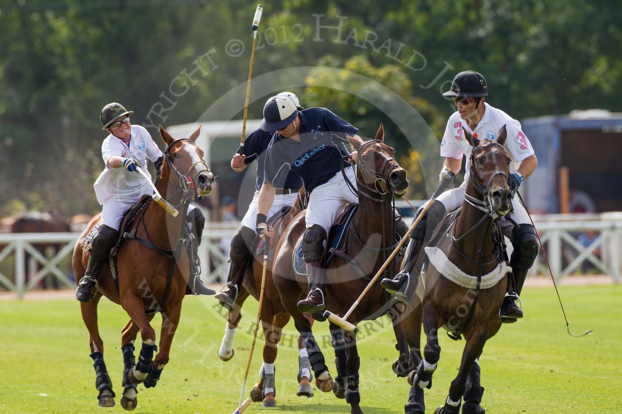 DBPC Polo in the Park 2012: Dawson Group Polo Team #2, Josh Cork, Quicksilver #3, Philip Baker, #2, Ed Batchelor, and Dawson Group #3, Michael Henderson..
Dallas Burston Polo Club,
Stoneythorpe Estate,
Southam,
Warwickshire,
United Kingdom,
on 16 September 2012 at 13:39, image #153