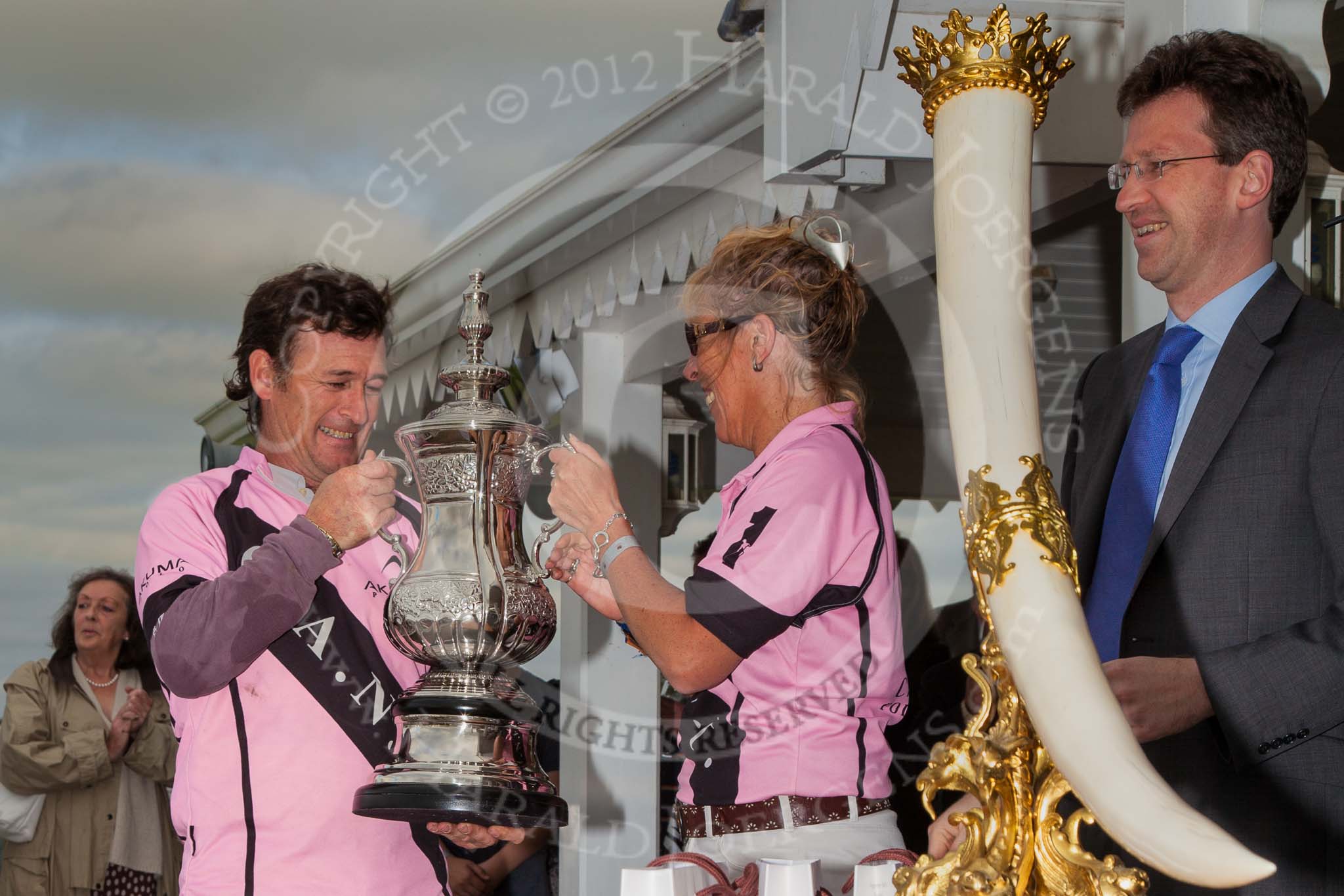 DBPC Polo in the Park 2012: Lousie Jebson and Sebastian Funes of the C.A.N.I. team, the winner of the 4 Goal Tusk Trophy Tournament. On the right Southam and Kenilworth MP Jeremy Clark..
Dallas Burston Polo Club,
Stoneythorpe Estate,
Southam,
Warwickshire,
United Kingdom,
on 16 September 2012 at 16:40, image #251