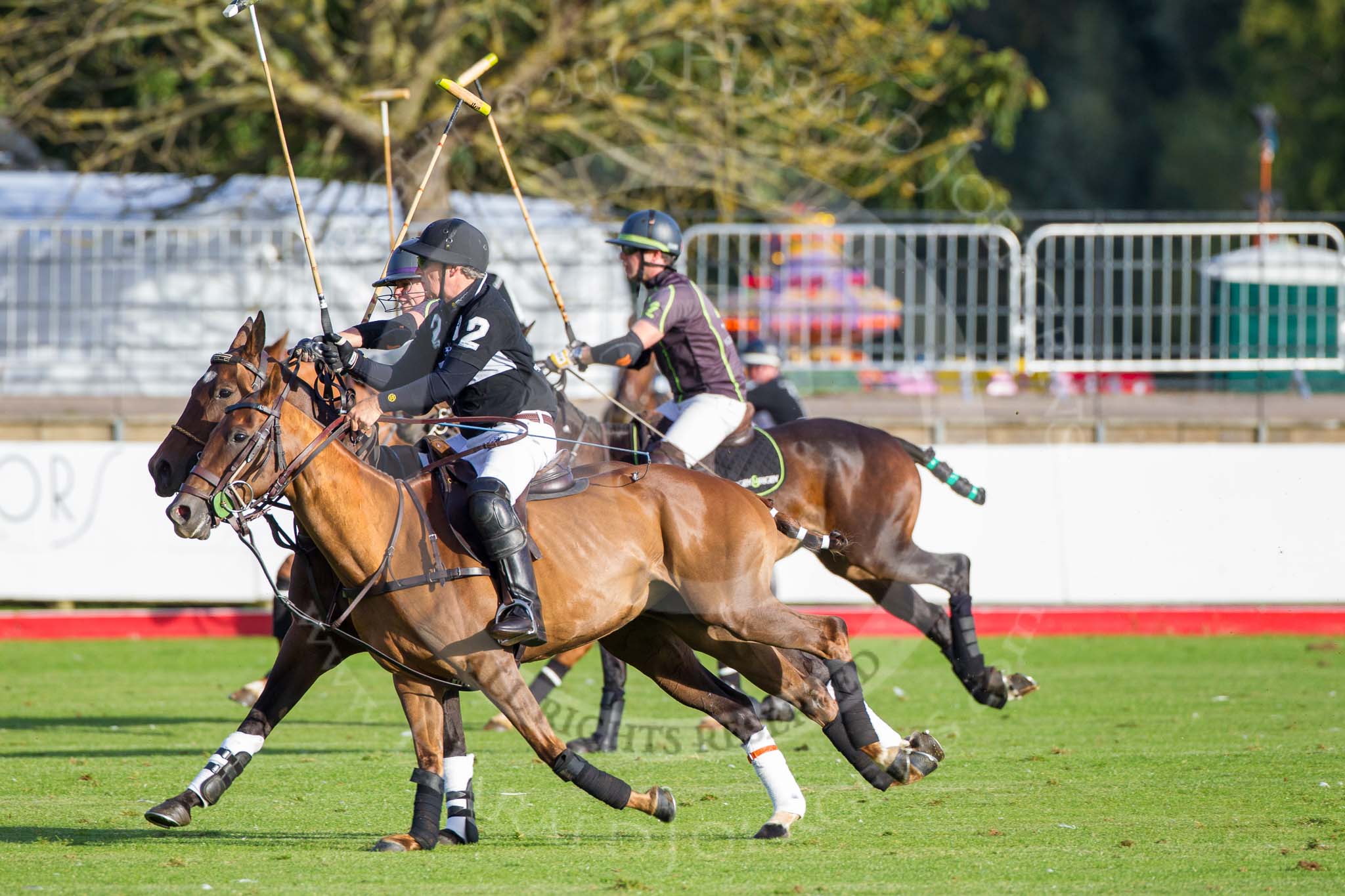 Photo 1209161706231D47006HaraldJoergens DBPC Polo in the Park 2012: Rigby & Rigby #1 and #2, Jenny and Steve Rigby, and La Golondrina #2, Paul Oberschneider..
Dallas Burston Polo Club,
Stoneythorpe Estate,
Southam,
Warwickshire,
United Kingdom,
on 16 September 2012 at 17:06, image #270