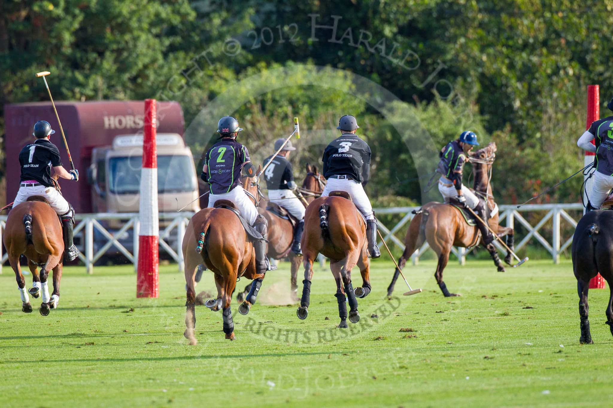 DBPC Polo in the Park 2012: La Golondrina v Rigby & Rigby..
Dallas Burston Polo Club,
Stoneythorpe Estate,
Southam,
Warwickshire,
United Kingdom,
on 16 September 2012 at 17:26, image #279