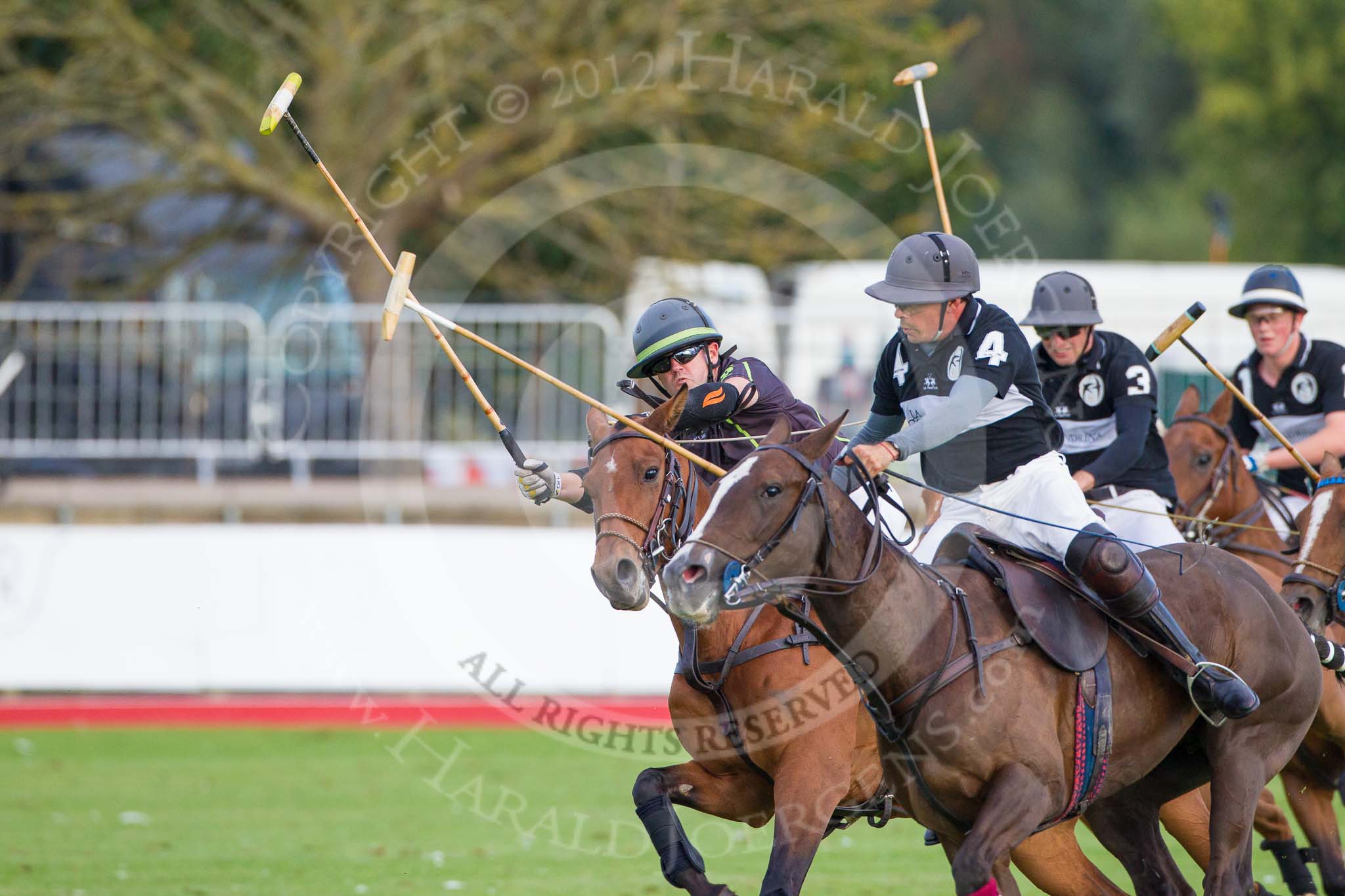 DBPC Polo in the Park 2012: Rigby & Rigby #2, Steve Rigby, and La Golondrina #4. Matias Carrique..
Dallas Burston Polo Club,
Stoneythorpe Estate,
Southam,
Warwickshire,
United Kingdom,
on 16 September 2012 at 17:37, image #288