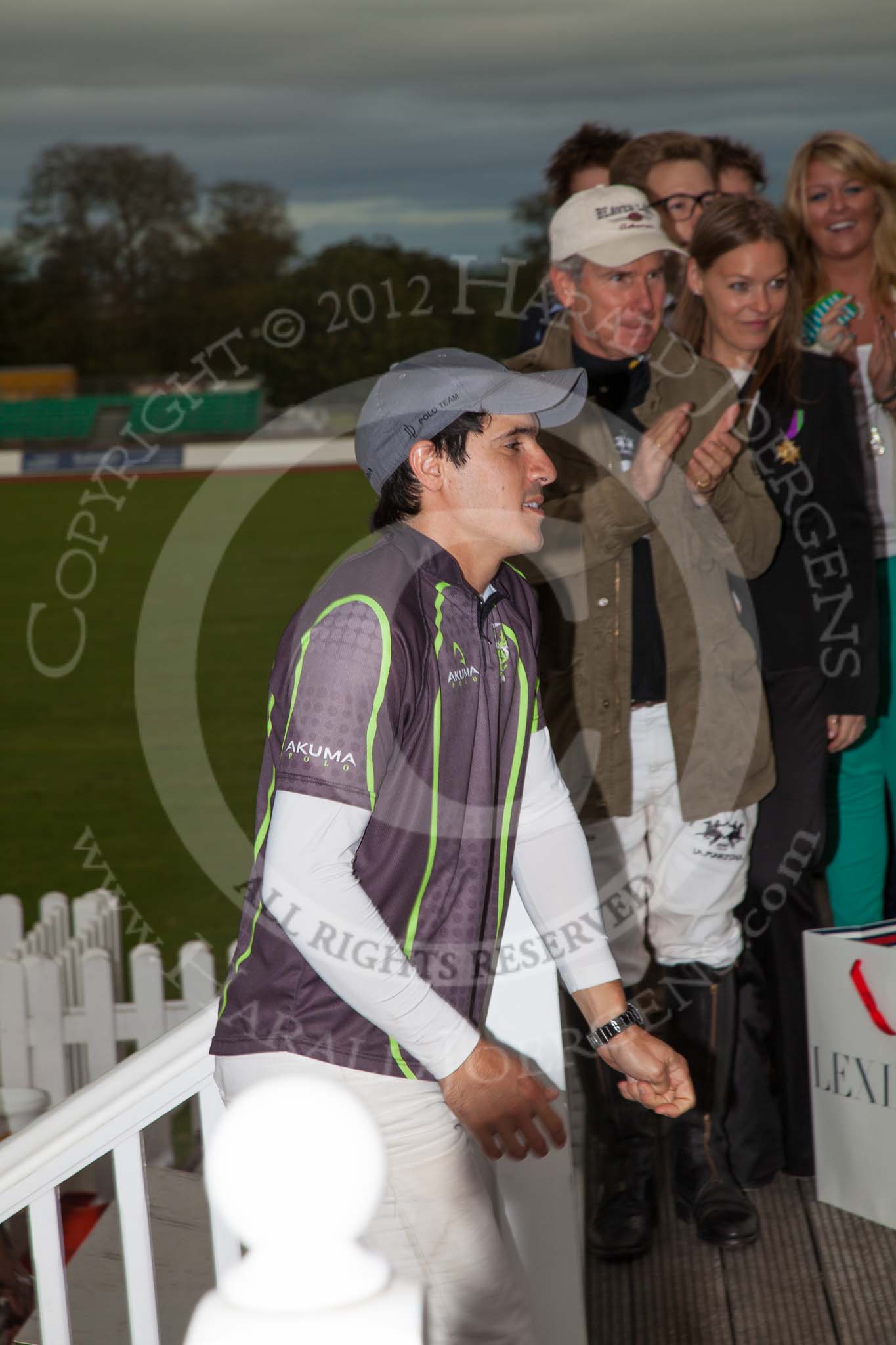 DBPC Polo in the Park 2012: Runner-up for the Dallas Burston Gold Cup Tournament was the team Rigby & Rigby. Here: Tomy Iriarte, behind her the winning La Golondrina team..
Dallas Burston Polo Club,
Stoneythorpe Estate,
Southam,
Warwickshire,
United Kingdom,
on 16 September 2012 at 18:12, image #316