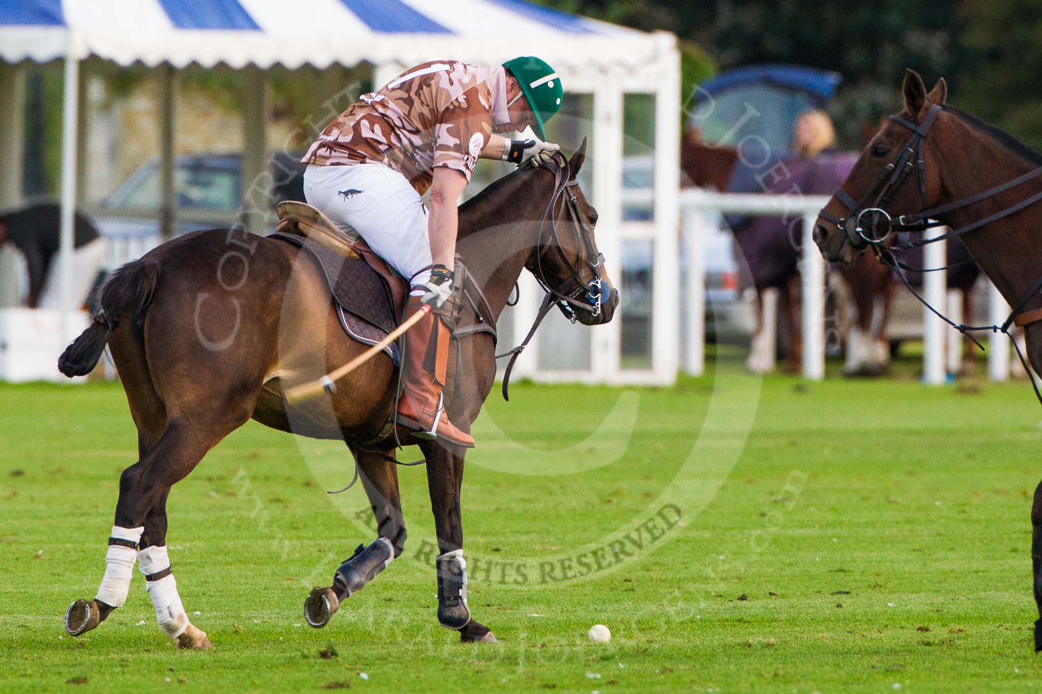 DBPC Polo in the Park 2012: Royal Artillery #1, Bombardier Richard Morris..
Dallas Burston Polo Club,
Stoneythorpe Estate,
Southam,
Warwickshire,
United Kingdom,
on 16 September 2012 at 18:32, image #323