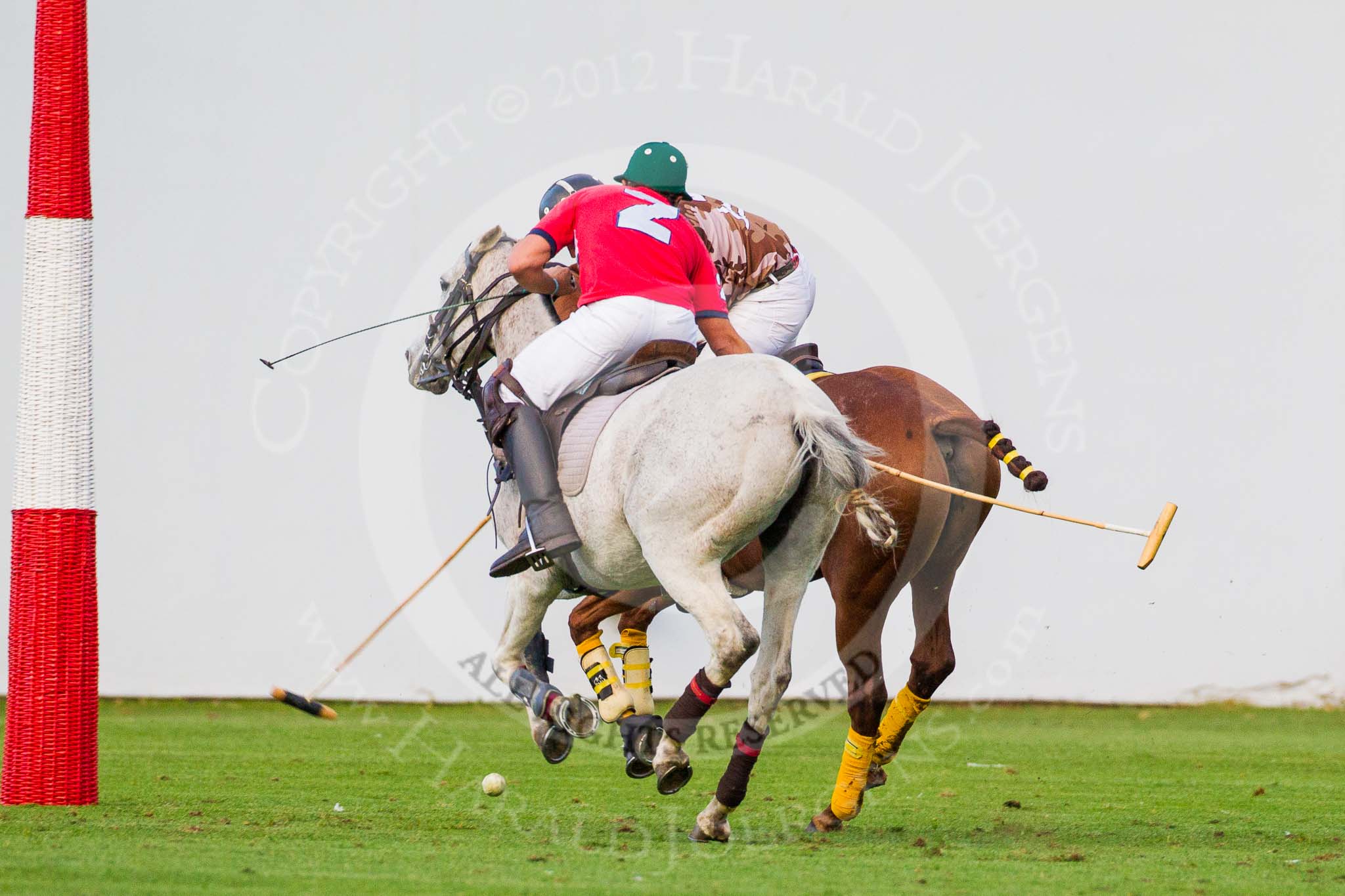 DBPC Polo in the Park 2012: DBPC #2, Captain William Mawby, and Royal Artillery #3, Karl-Uwe Martinez..
Dallas Burston Polo Club,
Stoneythorpe Estate,
Southam,
Warwickshire,
United Kingdom,
on 16 September 2012 at 18:34, image #324