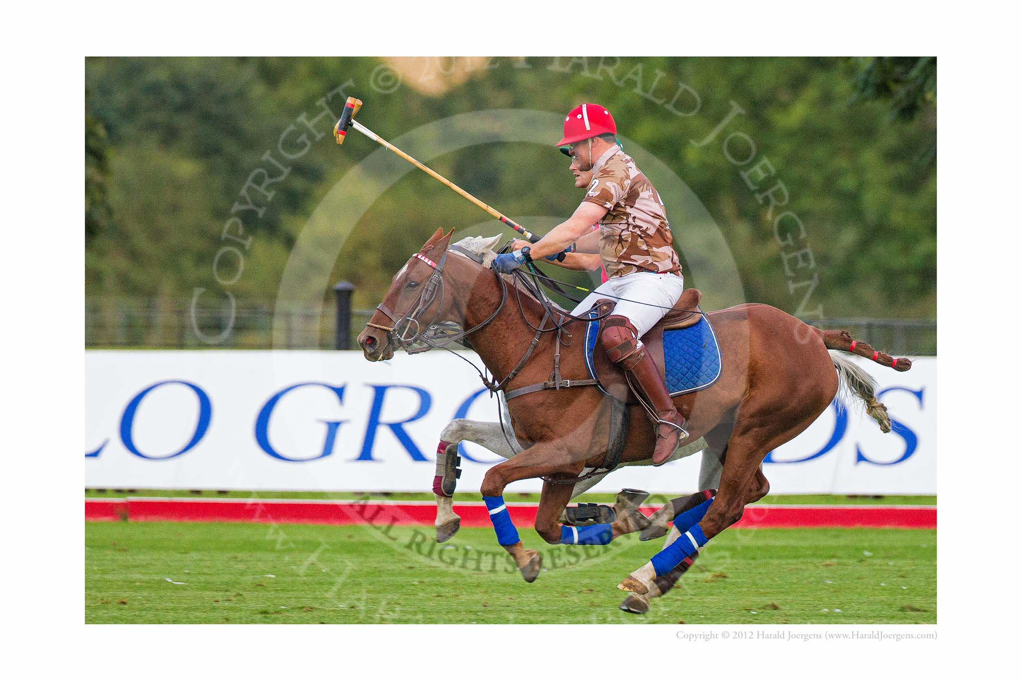 DBPC Polo in the Park 2012: In perfect harmony - Royal Artillery #2, Major Andy Wood, and DBPC #2, Captain Willim Mawby..
Dallas Burston Polo Club,
Stoneythorpe Estate,
Southam,
Warwickshire,
United Kingdom,
on 16 September 2012 at 18:35, image #326