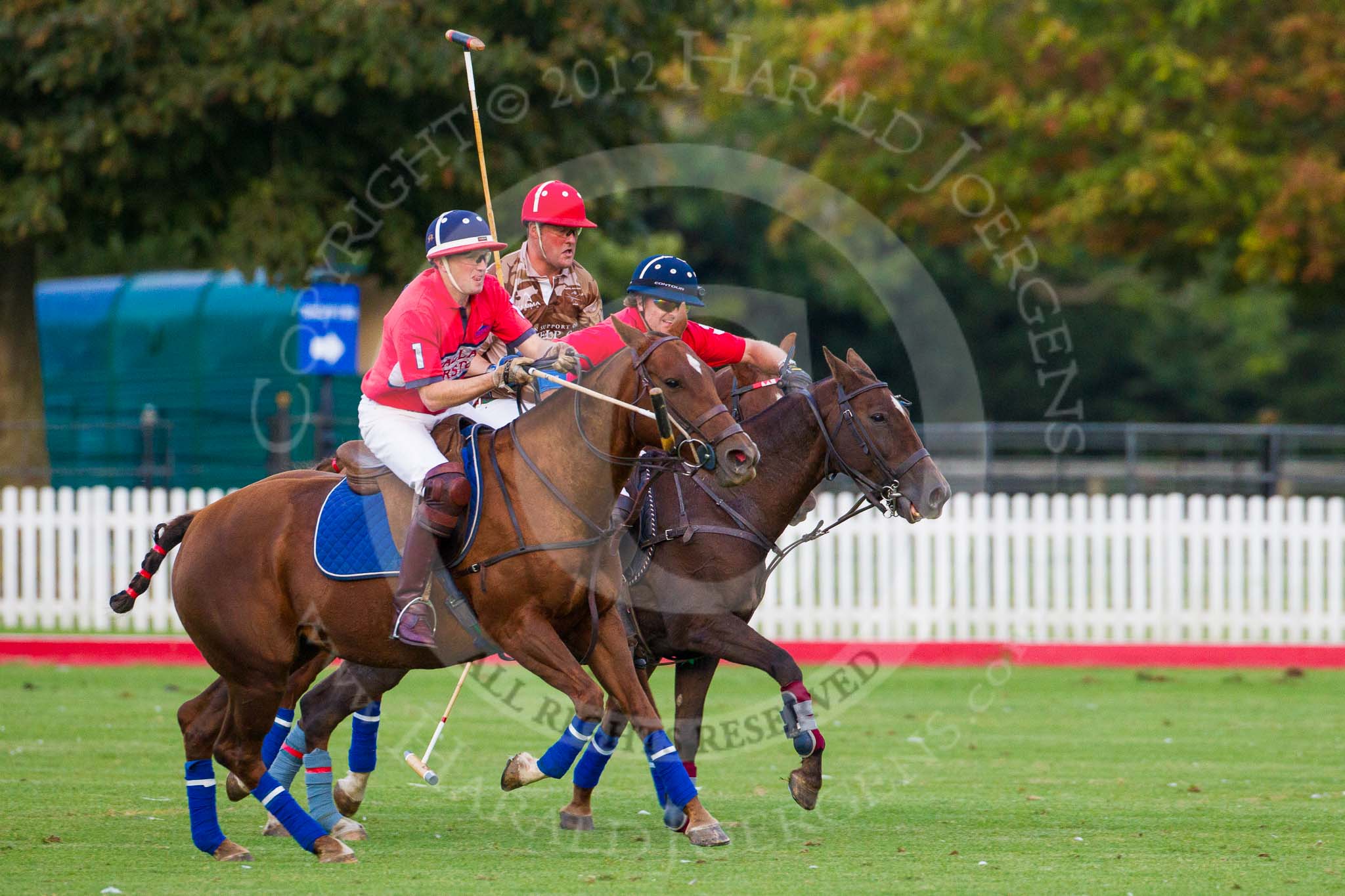 DBPC Polo in the Park 2012: DBPC #1, Major Robert Skeggs, #3, Mark Weller, and Royal Artillery #2, Major Andy Wood..
Dallas Burston Polo Club,
Stoneythorpe Estate,
Southam,
Warwickshire,
United Kingdom,
on 16 September 2012 at 18:37, image #328