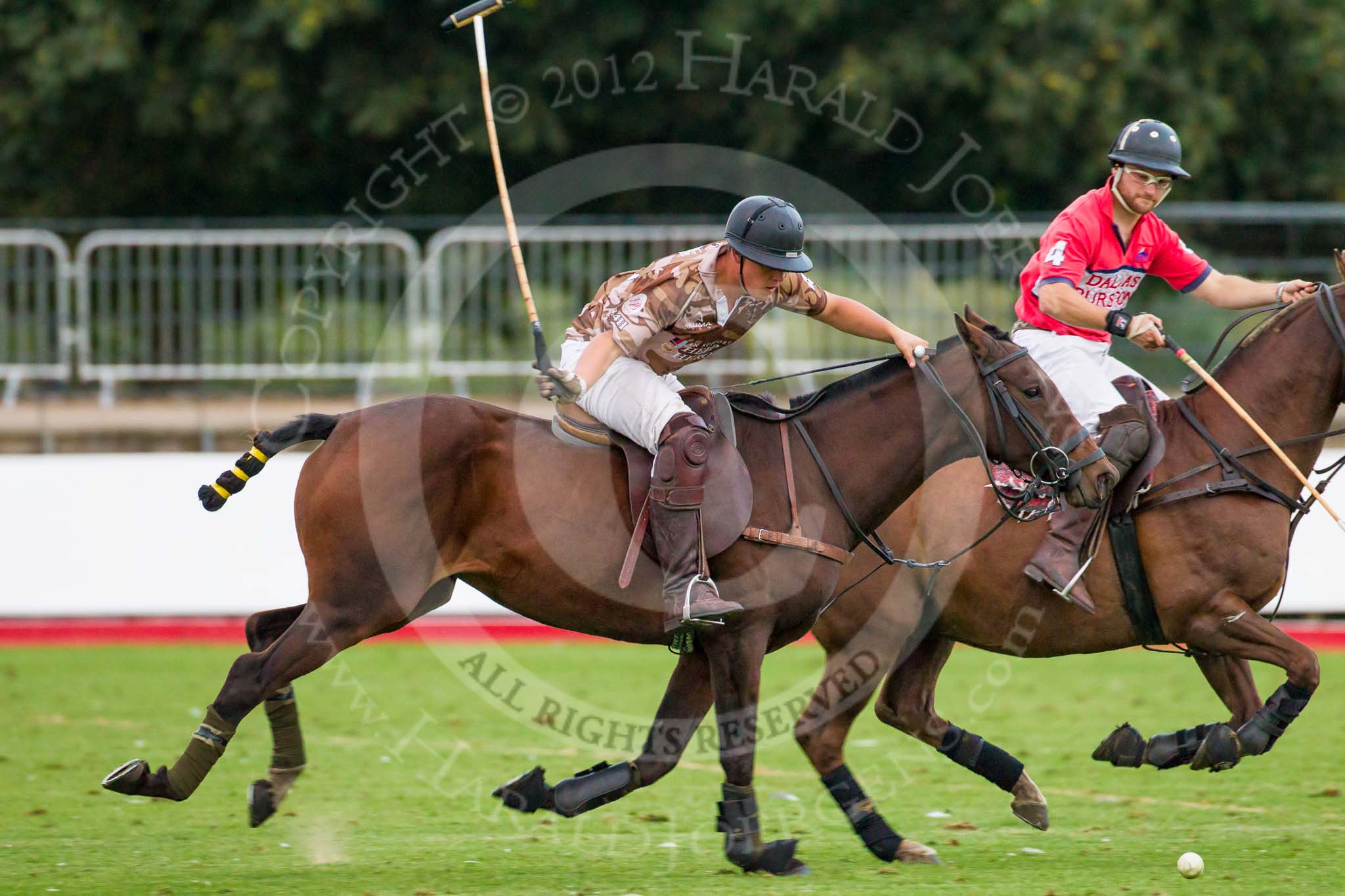 DBPC Polo in the Park 2012: Royal Artillery #4, Alex Vent, and DBPC #4, Will Wood..
Dallas Burston Polo Club,
Stoneythorpe Estate,
Southam,
Warwickshire,
United Kingdom,
on 16 September 2012 at 18:55, image #335