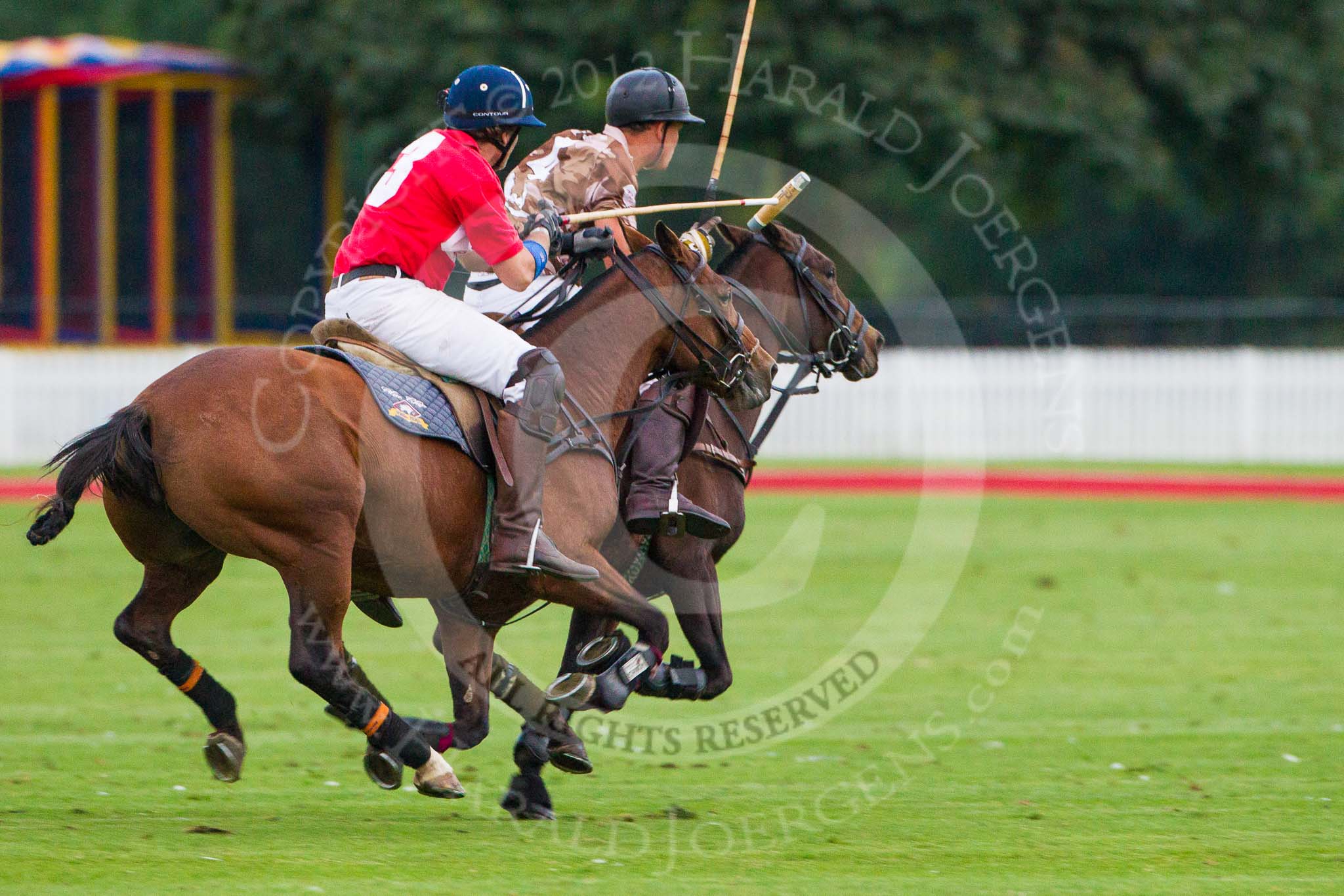 DBPC Polo in the Park 2012: DBPC #3, Mark Weller, and Royal Artillery #4, Alex Vent..
Dallas Burston Polo Club,
Stoneythorpe Estate,
Southam,
Warwickshire,
United Kingdom,
on 16 September 2012 at 18:55, image #336