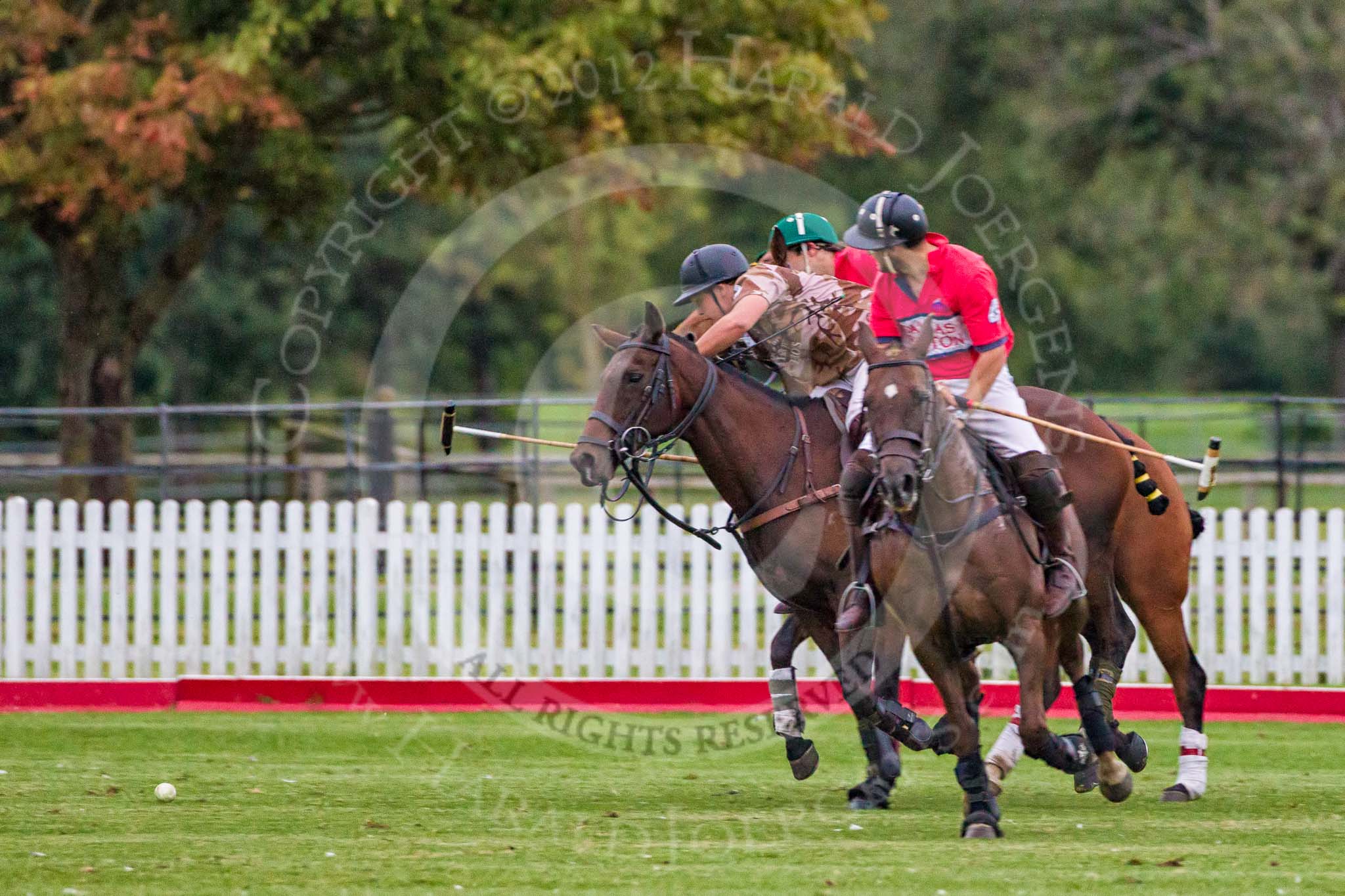DBPC Polo in the Park 2012: Royal Artillery #4, Alex Vent, against DBPC #2, Captain William Mawby, and #4, Will Wood..
Dallas Burston Polo Club,
Stoneythorpe Estate,
Southam,
Warwickshire,
United Kingdom,
on 16 September 2012 at 19:01, image #343