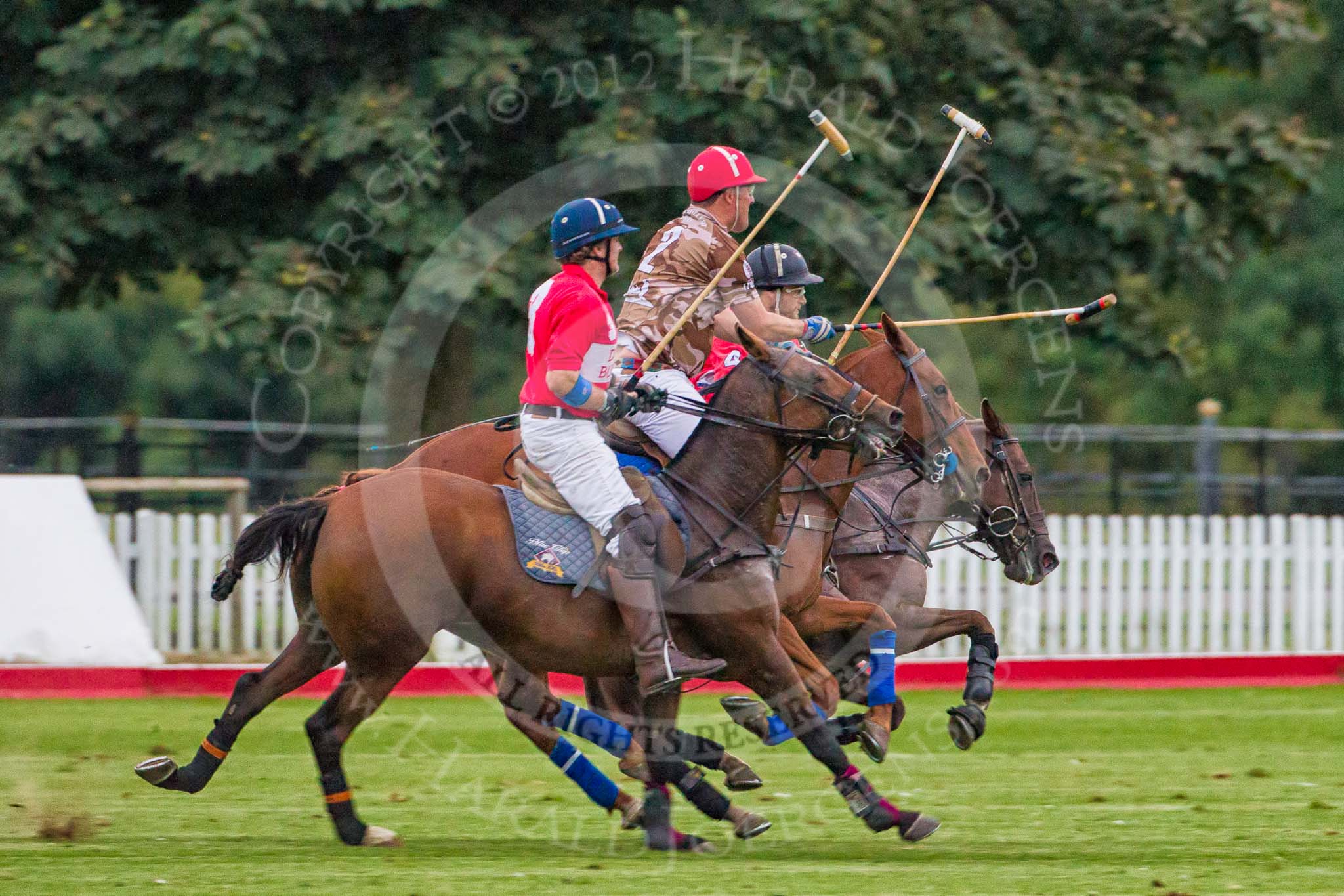 DBPC Polo in the Park 2012: DBPC #3, Mark Weller, Royal Artillery #2, Major Andy Wood, and DBPC #4, Will Wood..
Dallas Burston Polo Club,
Stoneythorpe Estate,
Southam,
Warwickshire,
United Kingdom,
on 16 September 2012 at 19:02, image #345