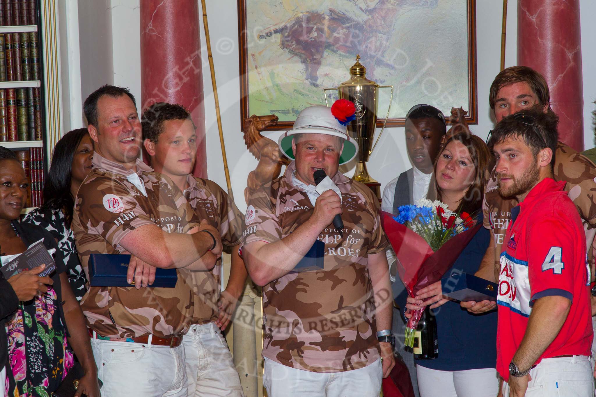 DBPC Polo in the Park 2012: Major Andy Wood, Alex Vent, Bombardier Richard Morris, and a slightly hidden Karl Ude-Martinez for the Royal Artillery polo team at the price giving in the clubhouse, on the right  - DBPC team #4 Will Wood..
Dallas Burston Polo Club,
Stoneythorpe Estate,
Southam,
Warwickshire,
United Kingdom,
on 16 September 2012 at 19:20, image #357