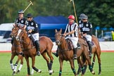 DBPC Polo in the Park 2012: La Golondrina #1, Hugo Davis, #2, Paul Oberschneider, #4, Matias Carrique, and #3, Pedro Harrison, with umpire Martin Fewster..
Dallas Burston Polo Club,
Stoneythorpe Estate,
Southam,
Warwickshire,
United Kingdom,
on 16 September 2012 at 17:21, image #272