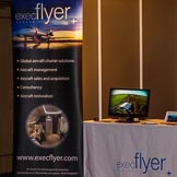 Grand Opening of the DBPC IXL Event Centre: The ExecFlyer booth in the IXL Event Centre..
Dallas Burston Polo Club, Stoneythorpe Estate,
Southam,
Warwickshire,
United Kingdom,
on 05 December 2013 at 18:32, image #79
