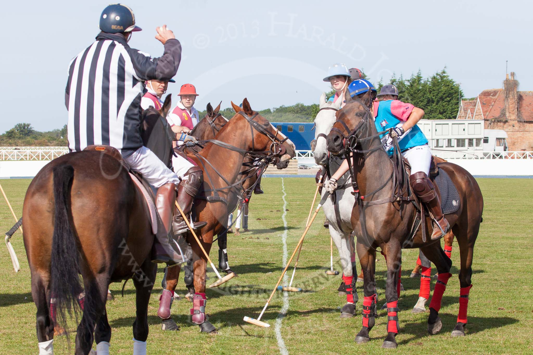 DBPC Polo in the Park 2013, Subsidiary Final Amaranther Trophy (0 Goal), Leadenham vs Kingsbridge: Umpire Crispin Matthews at the throw-in, on the left the Kingsbridge team, Leadenham on the right..
Dallas Burston Polo Club, ,
Southam,
Warwickshire,
United Kingdom,
on 01 September 2013 at 10:23, image #28