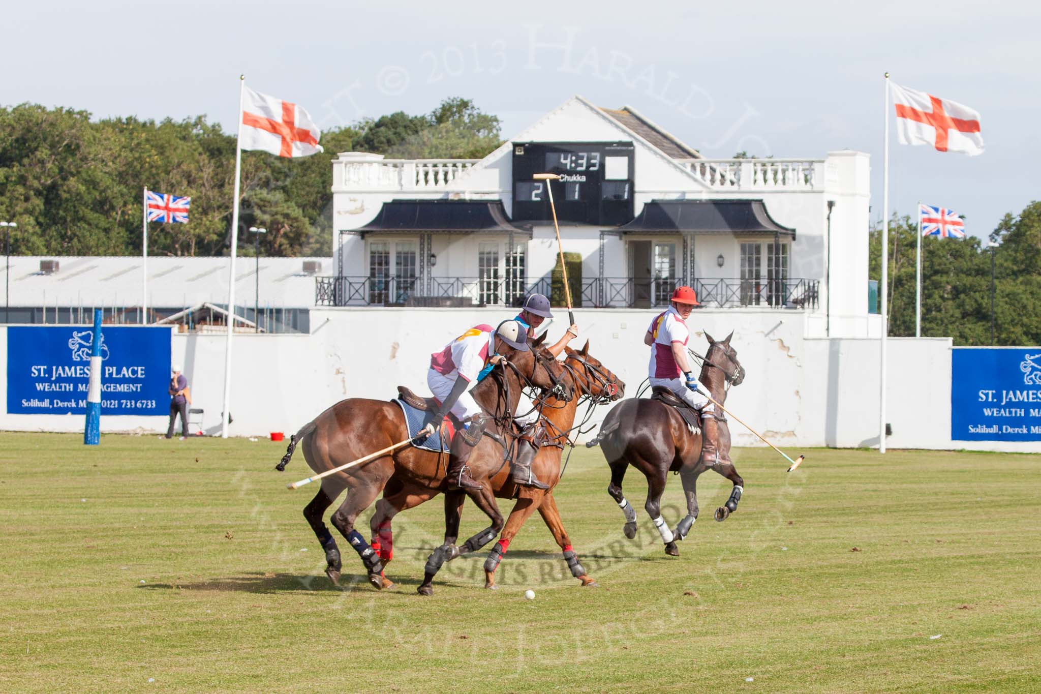 DBPC Polo in the Park 2013, Subsidiary Final Amaranther Trophy (0 Goal), Leadenham vs Kingsbridge: Kingsbridge player Edward Batchelor, Leadenham's Cameron Houston, and Kingsbridge's Jon Hickman..
Dallas Burston Polo Club, ,
Southam,
Warwickshire,
United Kingdom,
on 01 September 2013 at 10:28, image #34