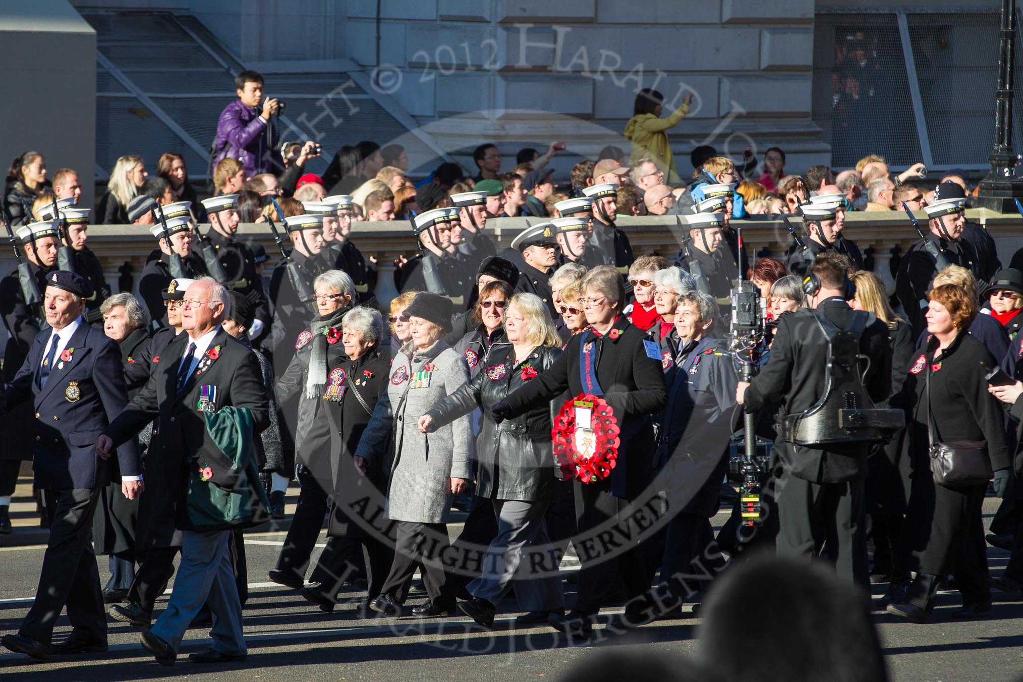 Remembrance Sunday 2012 Cenotaph March Past: Group E26 - Ton Class Association and E27 - Queen Alexandra's Royal Naval Nursing Service..
Whitehall, Cenotaph,
London SW1,

United Kingdom,
on 11 November 2012 at 11:41, image #191