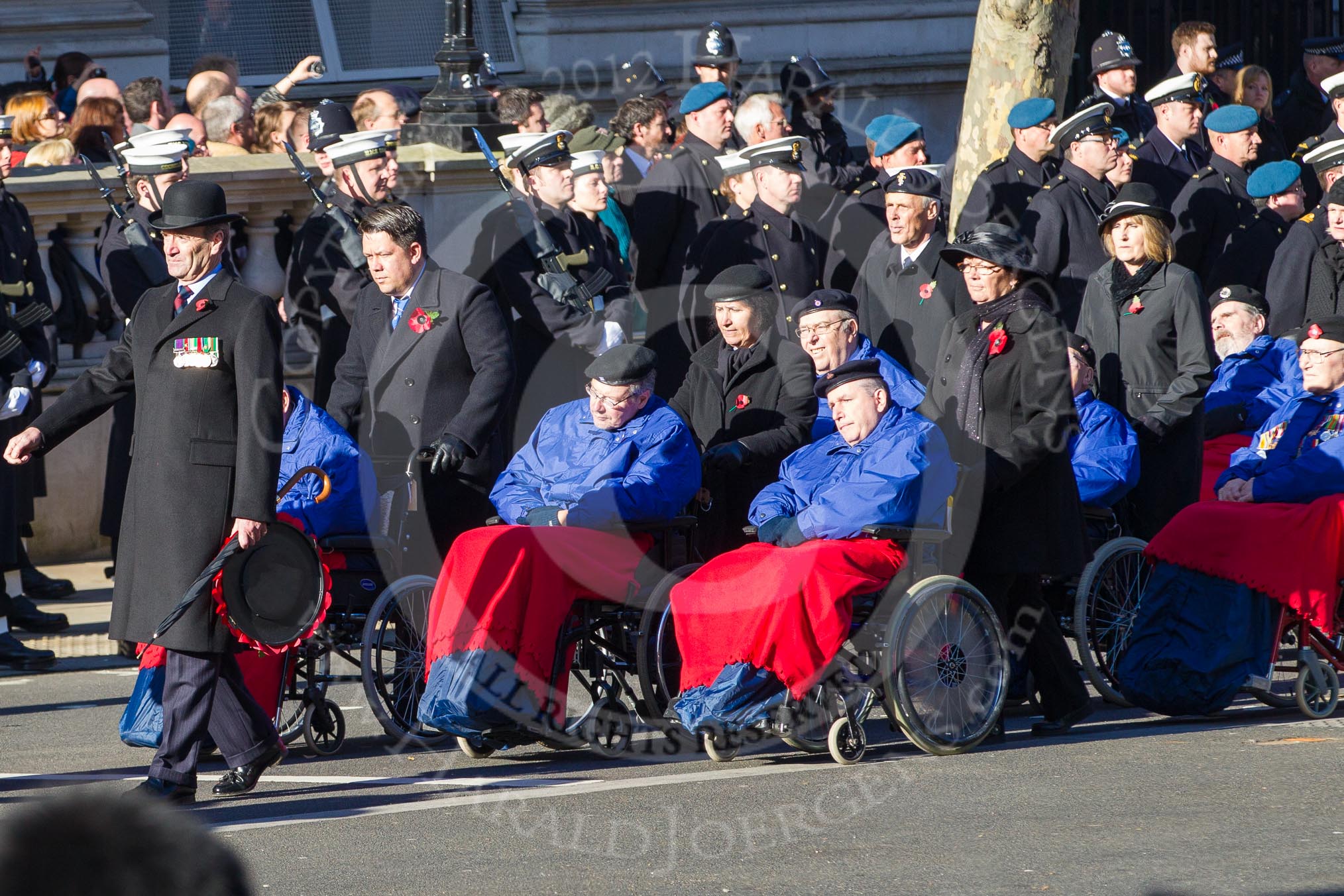 Remembrance Sunday 2012 Cenotaph March Past: Group E44 - Queen Alexandra's Hospital Home for Disabled Ex-Servicemen & Women..
Whitehall, Cenotaph,
London SW1,

United Kingdom,
on 11 November 2012 at 11:44, image #350