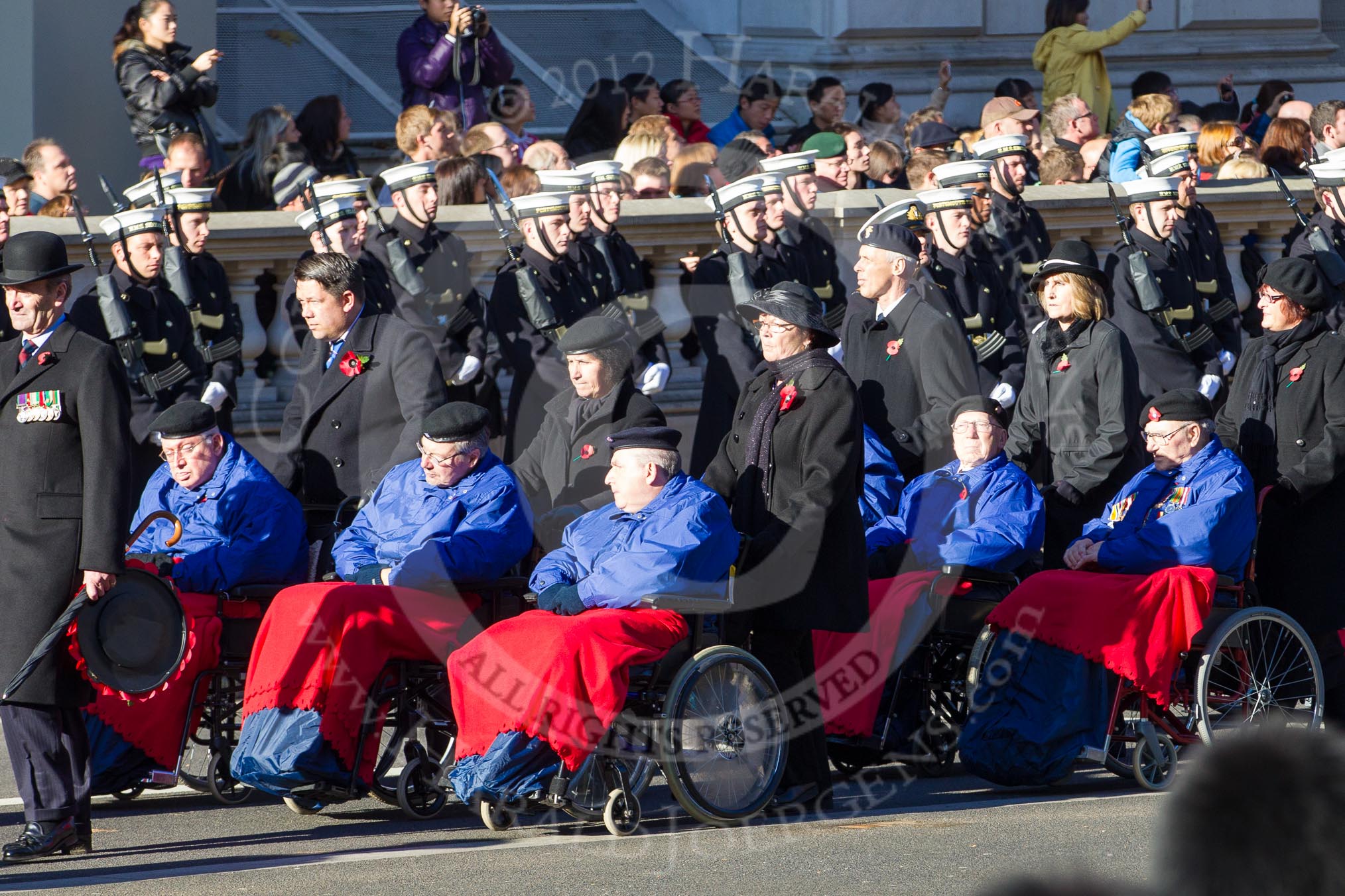Remembrance Sunday 2012 Cenotaph March Past: Group E44 - Queen Alexandra's Hospital Home for Disabled Ex-Servicemen & Women..
Whitehall, Cenotaph,
London SW1,

United Kingdom,
on 11 November 2012 at 11:44, image #353