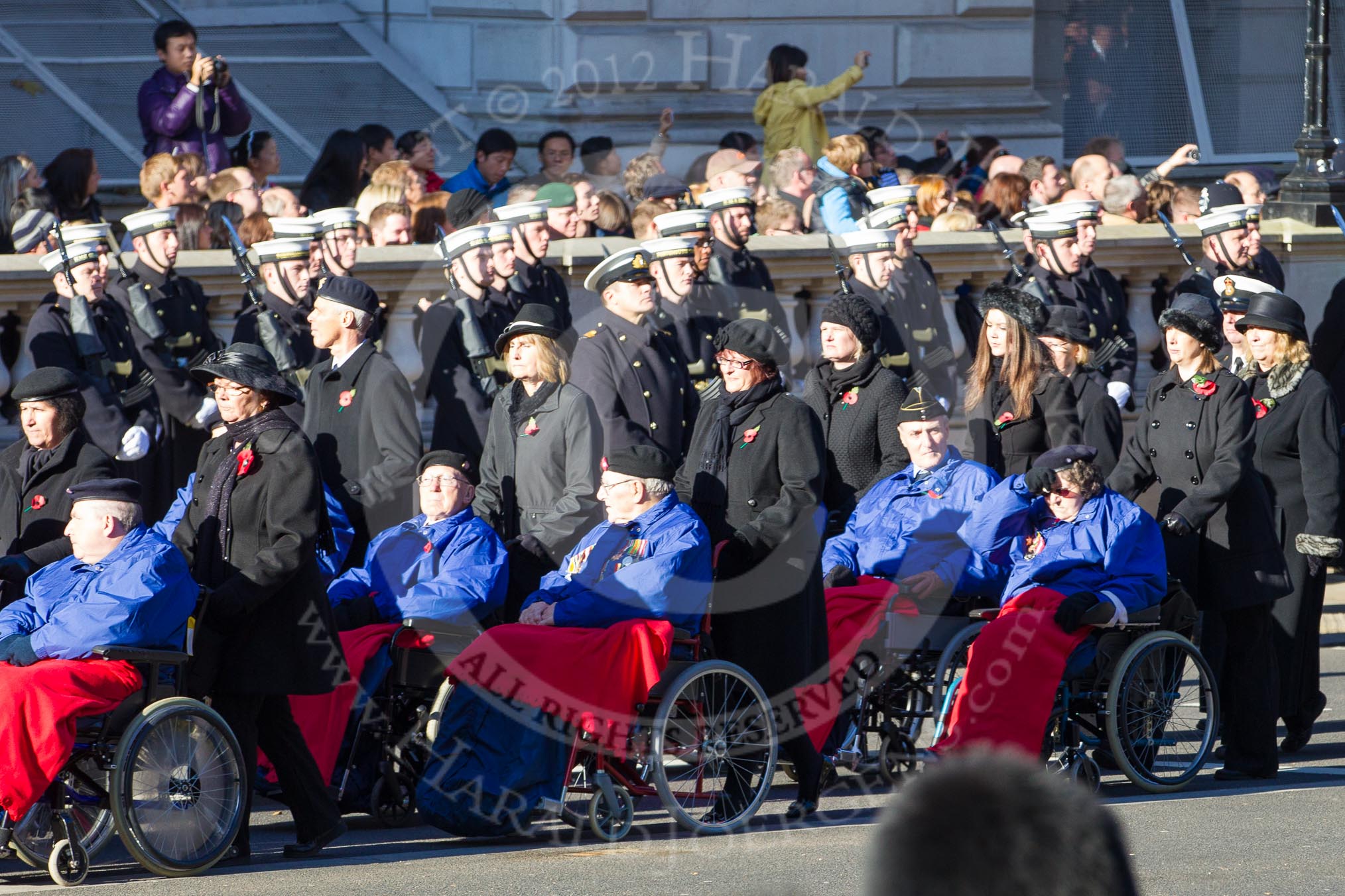 Remembrance Sunday 2012 Cenotaph March Past: Group E44 - Queen Alexandra's Hospital Home for Disabled Ex-Servicemen & Women..
Whitehall, Cenotaph,
London SW1,

United Kingdom,
on 11 November 2012 at 11:44, image #355