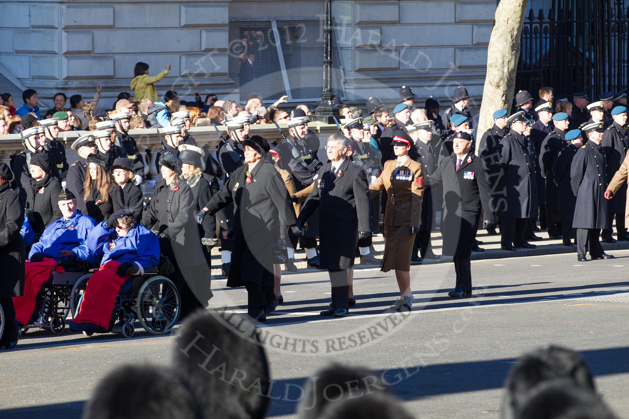Remembrance Sunday 2012 Cenotaph March Past: Group E44 - Queen Alexandra's Hospital Home for Disabled Ex-Servicemen & Women..
Whitehall, Cenotaph,
London SW1,

United Kingdom,
on 11 November 2012 at 11:44, image #357