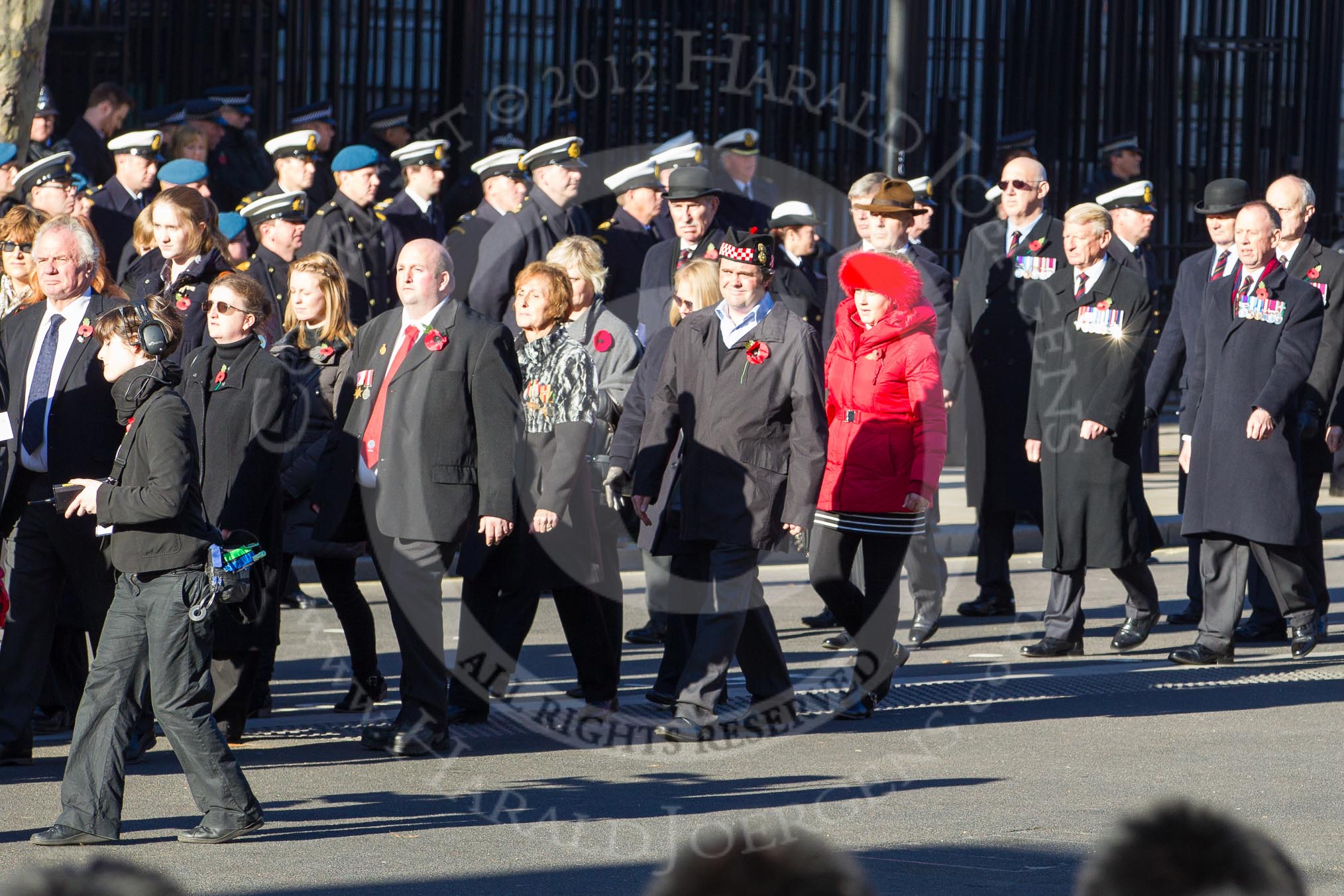 Remembrance Sunday 2012 Cenotaph March Past: Group F4 - Showmens' Guild of Great Britain and F5 - Queen's Bodyguard of The Yeoman of The Guard..
Whitehall, Cenotaph,
London SW1,

United Kingdom,
on 11 November 2012 at 11:45, image #408