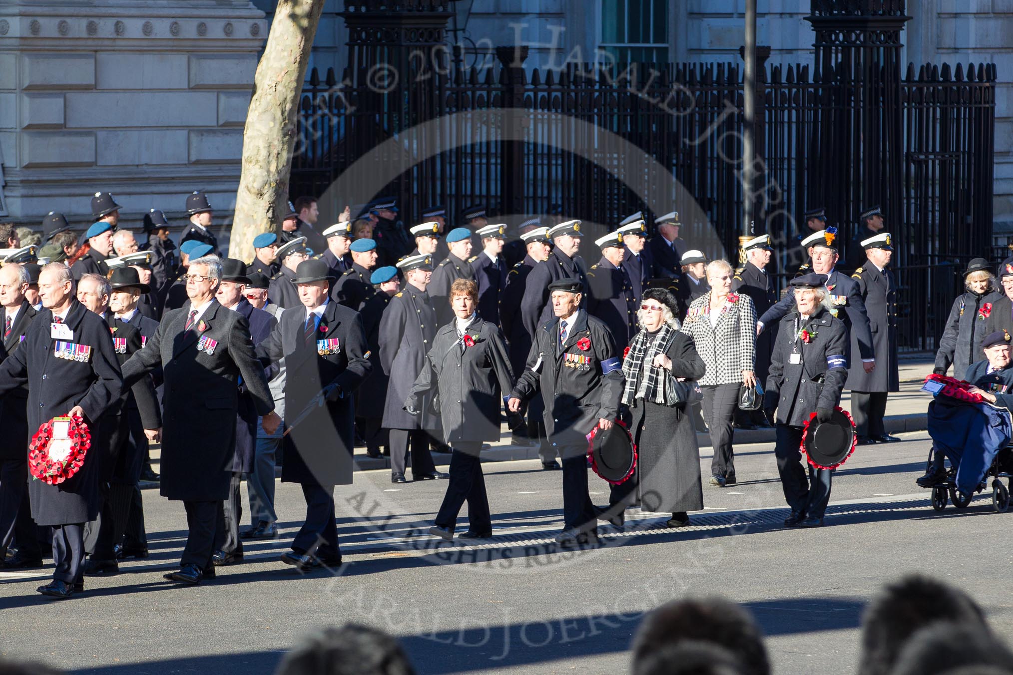 Remembrance Sunday 2012 Cenotaph March Past: Group F5 - Queen's Bodyguard of The Yeoman of The Guard and F6 - Popski's Private Army..
Whitehall, Cenotaph,
London SW1,

United Kingdom,
on 11 November 2012 at 11:45, image #417