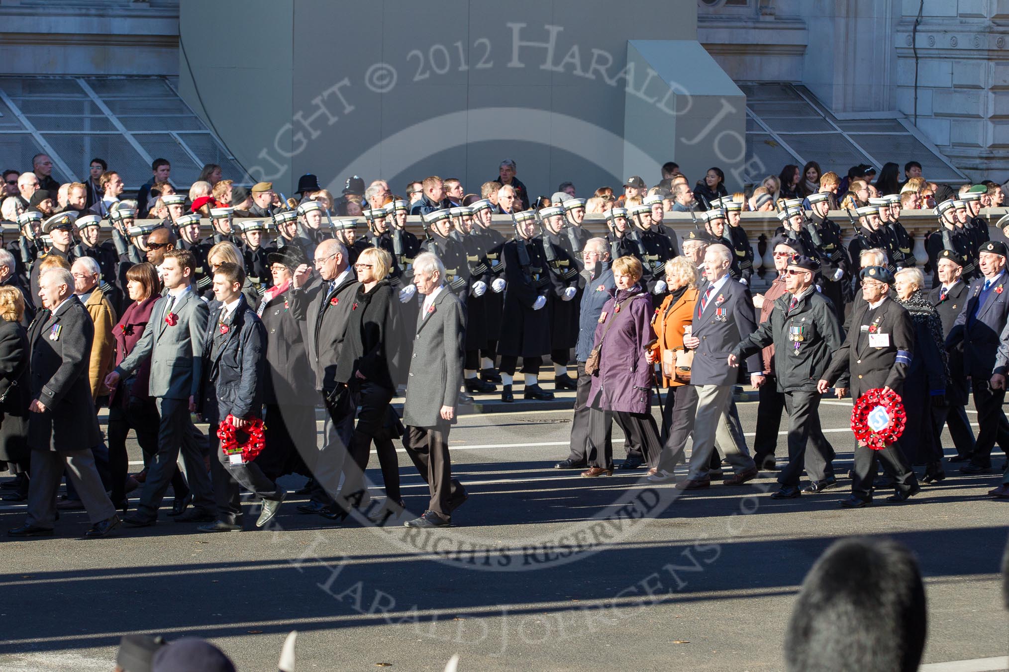 Remembrance Sunday 2012 Cenotaph March Past: Group F15 - National Gulf Veterans & Families Association, and F16 - Fellowship of the Services..
Whitehall, Cenotaph,
London SW1,

United Kingdom,
on 11 November 2012 at 11:47, image #533