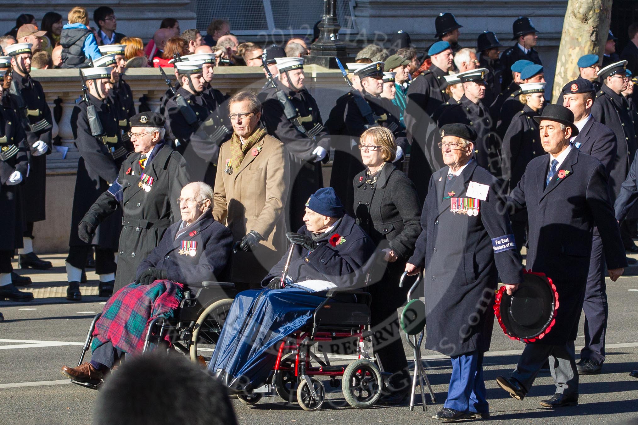 Remembrance Sunday 2012 Cenotaph March Past: Group F18 - Far East Prisoners of War..
Whitehall, Cenotaph,
London SW1,

United Kingdom,
on 11 November 2012 at 11:48, image #543