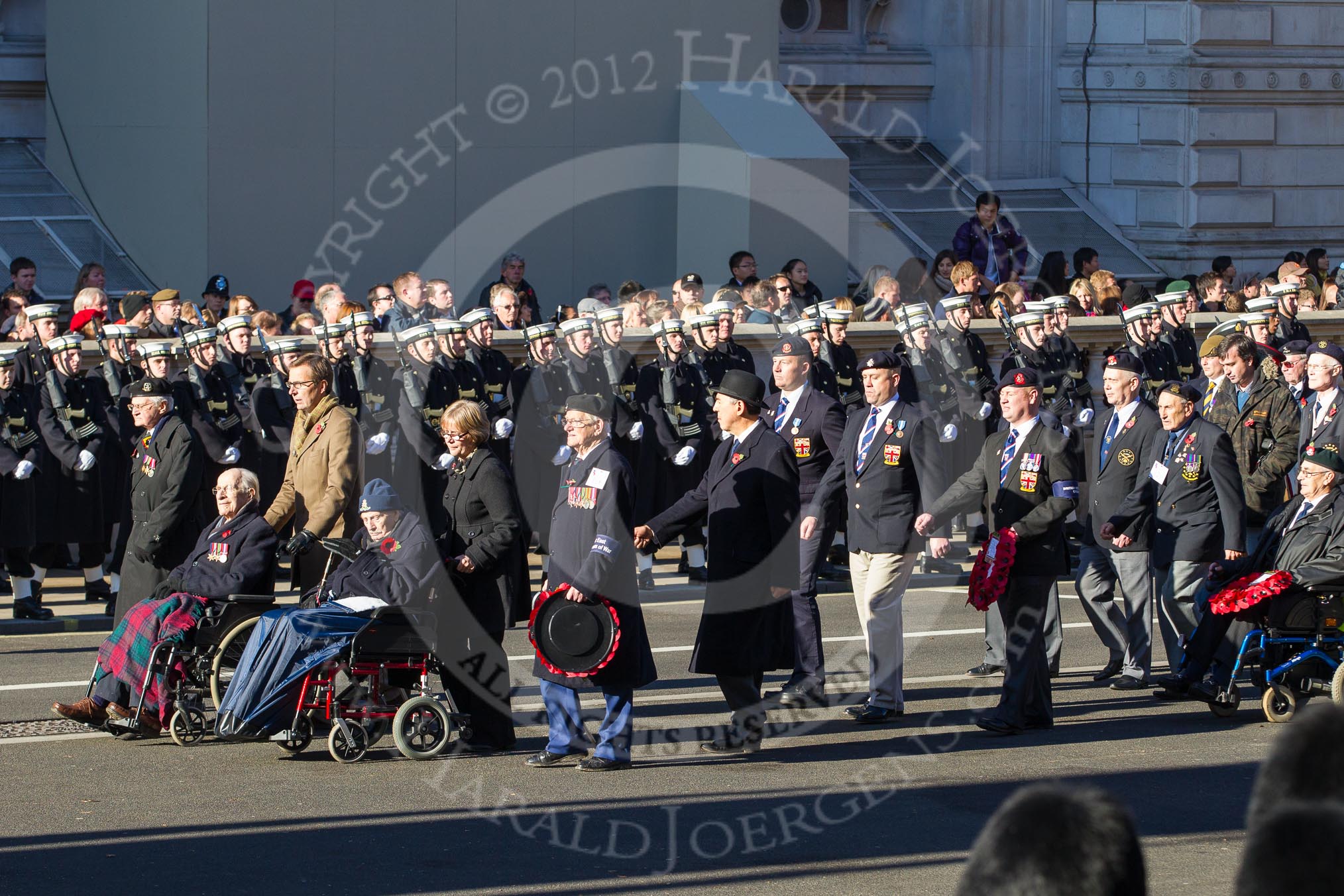 Remembrance Sunday 2012 Cenotaph March Past: Group F18 - Far East Prisoners of War and F19 - British Veterans Group..
Whitehall, Cenotaph,
London SW1,

United Kingdom,
on 11 November 2012 at 11:48, image #548