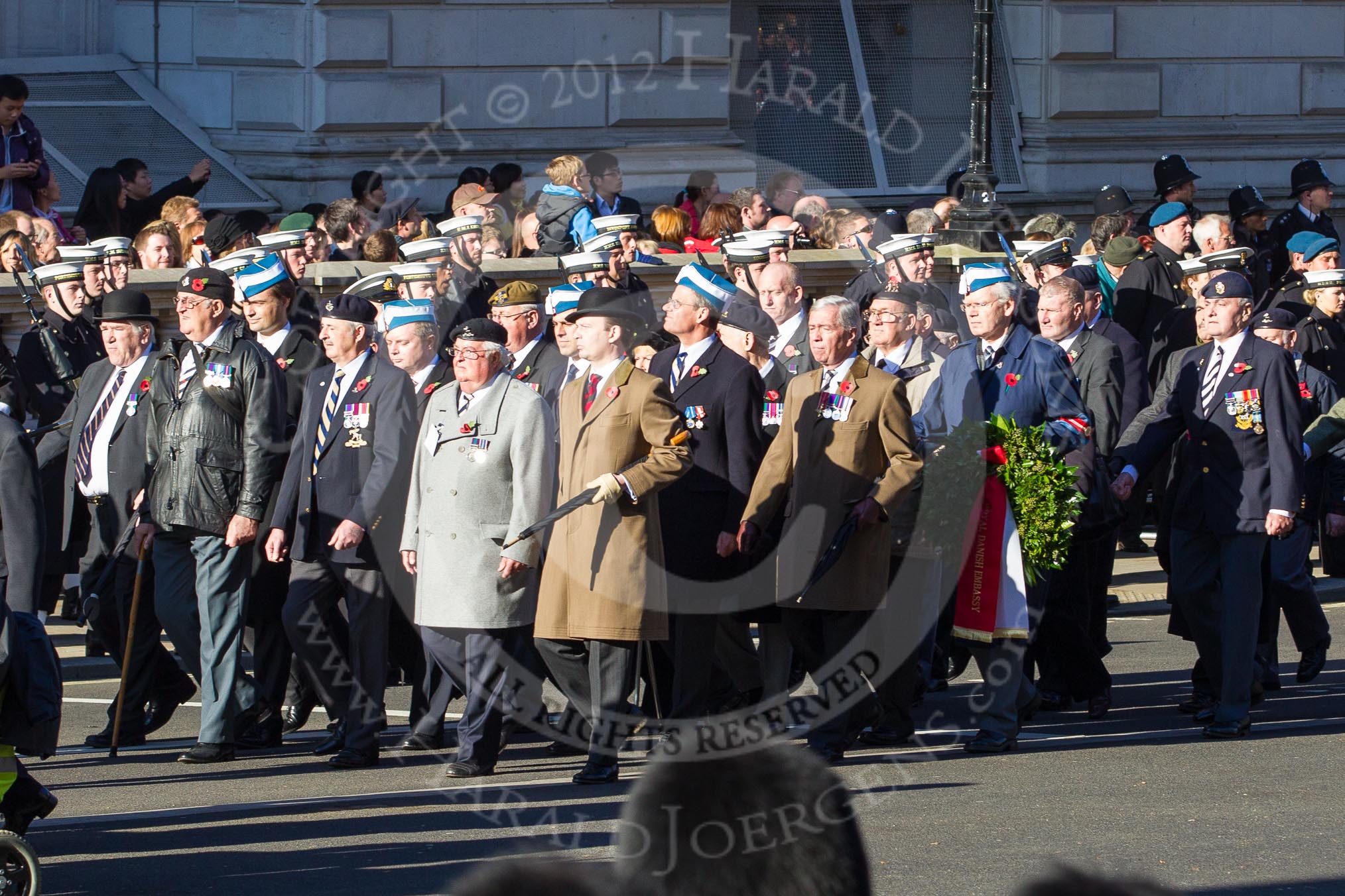Remembrance Sunday 2012 Cenotaph March Past: Group A1/2/3 - Princess of Wales's Royal Regiment/Prince of Wales's Leinster Regiment (Royal Canadians) Regimental Association/Royal East Kent Regiment (The Buffs) Past & Present Association..
Whitehall, Cenotaph,
London SW1,

United Kingdom,
on 11 November 2012 at 11:48, image #552