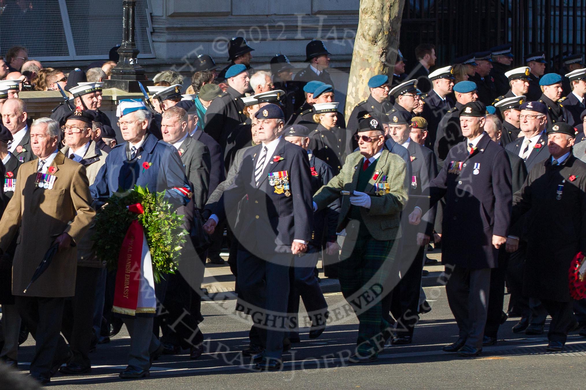 Remembrance Sunday 2012 Cenotaph March Past: Group A1/2/3 - Princess of Wales's Royal Regiment/Prince of Wales's Leinster Regiment (Royal Canadians) Regimental Association/Royal East Kent Regiment (The Buffs) Past & Present Association..
Whitehall, Cenotaph,
London SW1,

United Kingdom,
on 11 November 2012 at 11:48, image #553