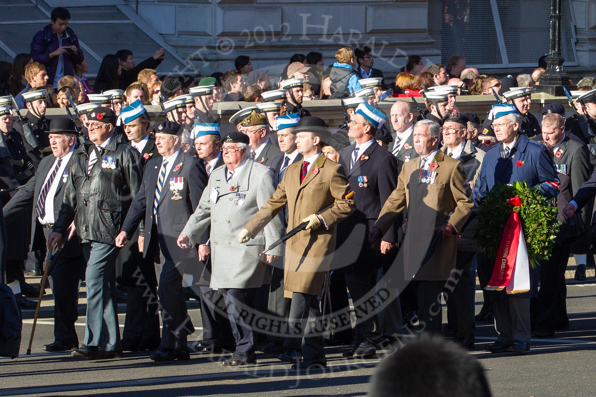 Remembrance Sunday 2012 Cenotaph March Past: Group A1/2/3 - Princess of Wales's Royal Regiment/Prince of Wales's Leinster Regiment (Royal Canadians) Regimental Association/Royal East Kent Regiment (The Buffs) Past & Present Association..
Whitehall, Cenotaph,
London SW1,

United Kingdom,
on 11 November 2012 at 11:48, image #554