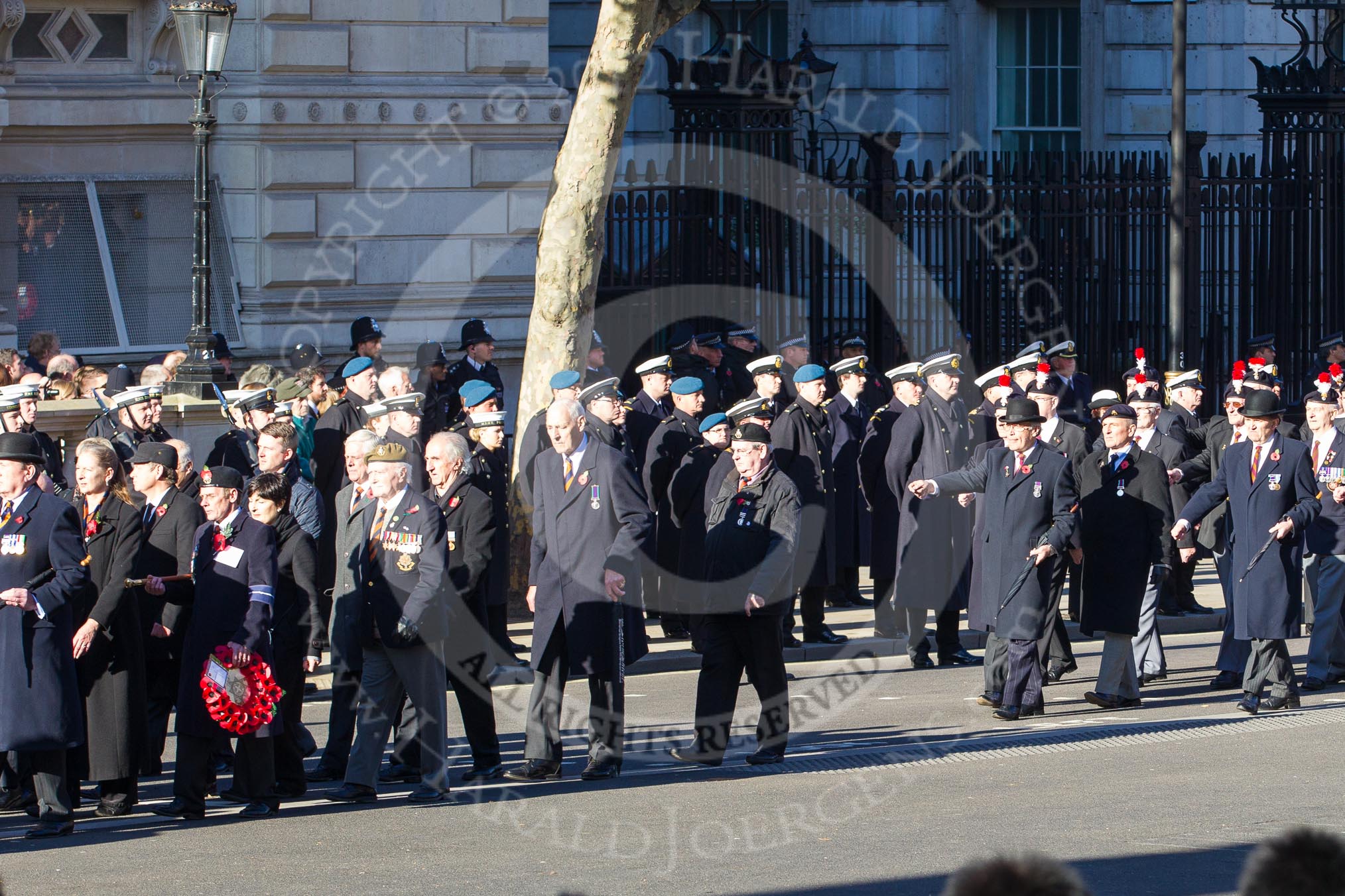 Remembrance Sunday 2012 Cenotaph March Past: Group A4 - Royal Sussex Regimental Association, A5 - Royal Hampshire Regiment Comrades Association, and A6 - Royal Regiment of Fusiliers..
Whitehall, Cenotaph,
London SW1,

United Kingdom,
on 11 November 2012 at 11:48, image #573