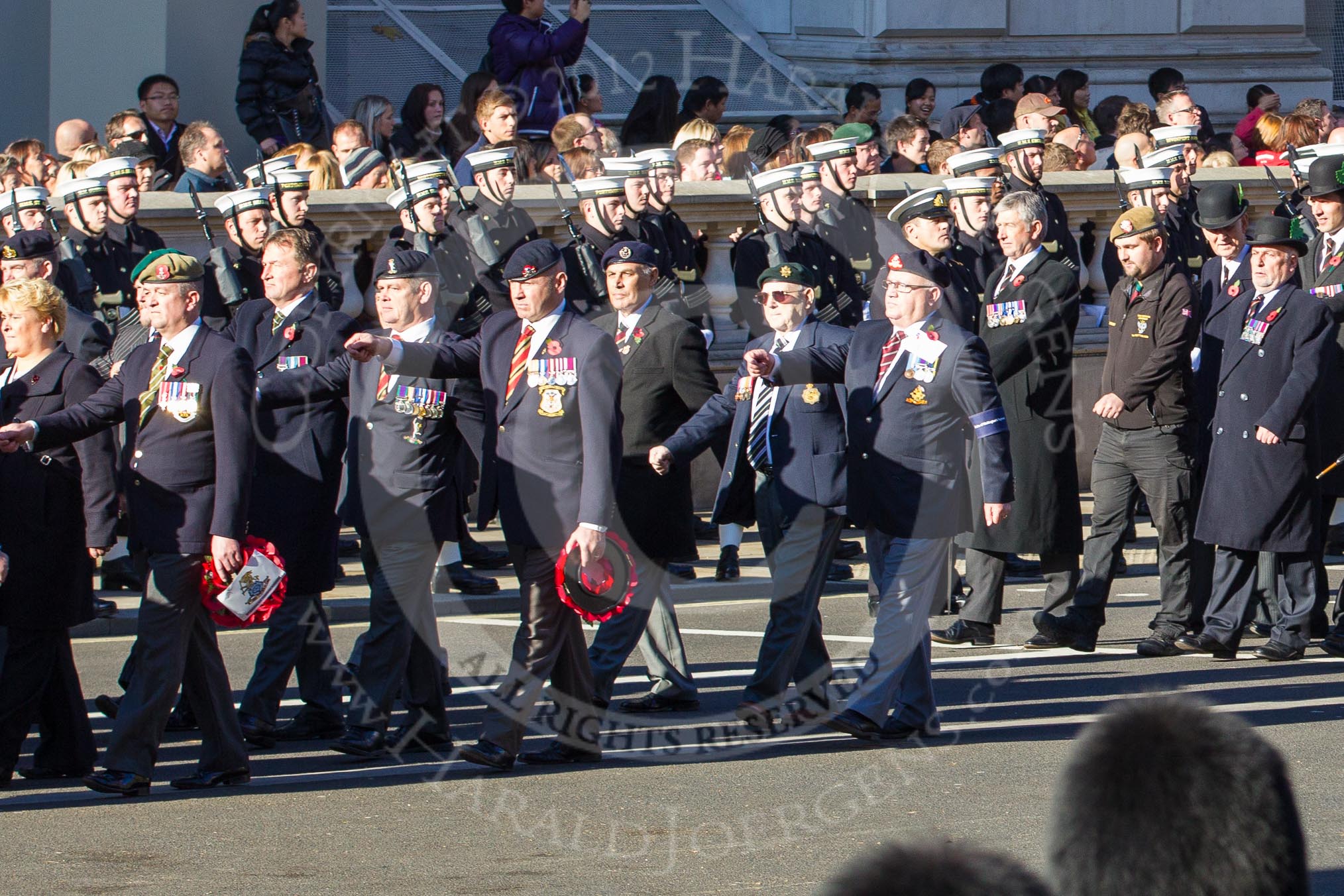 Remembrance Sunday 2012 Cenotaph March Past: Group A9 - Green Howards Association, A10 - Duke of Wellington's Regiment, and 11 - Cheshire Regiment Association..
Whitehall, Cenotaph,
London SW1,

United Kingdom,
on 11 November 2012 at 11:49, image #606