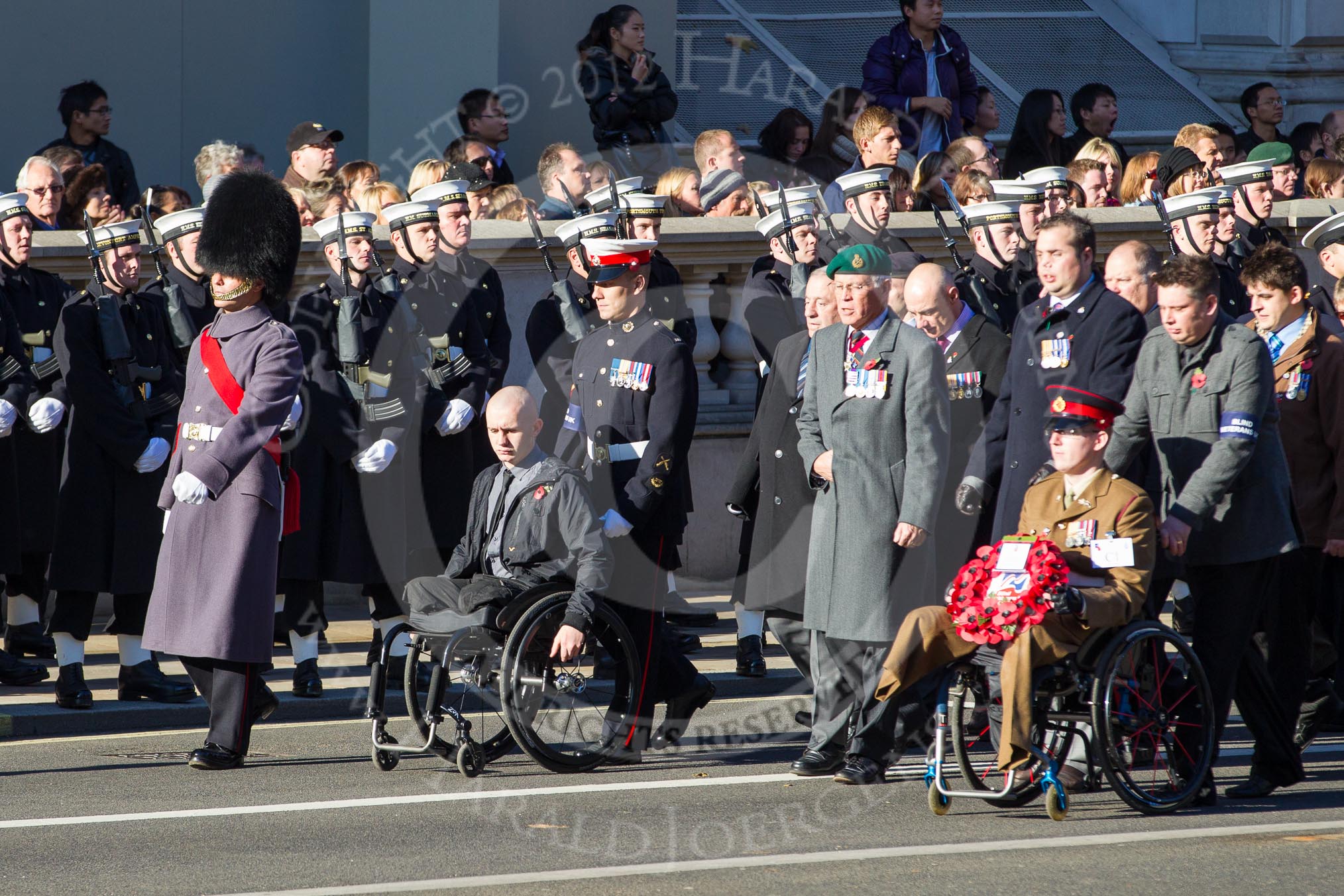 Remembrance Sunday 2012 Cenotaph March Past: Group C1, Blind Veterans UK, waiting for the rest of the column to get in line..
Whitehall, Cenotaph,
London SW1,

United Kingdom,
on 11 November 2012 at 11:53, image #774