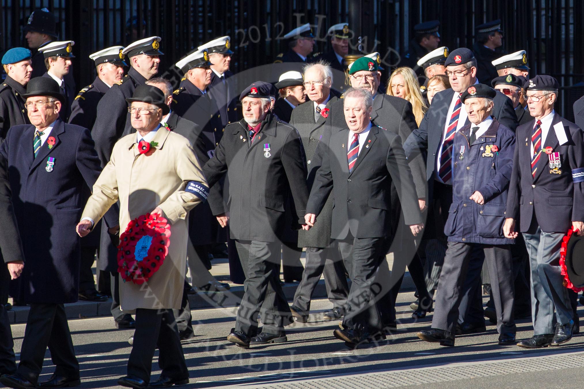 Remembrance Sunday 2012 Cenotaph March Past: Group B4 - The RAEC and ETS Branch Association, B5 - Royal Army Pay Corps Regimental Association, and B6 - Royal Army Veterinary Corps & Royal Army Dental Corps ..
Whitehall, Cenotaph,
London SW1,

United Kingdom,
on 11 November 2012 at 11:55, image #839