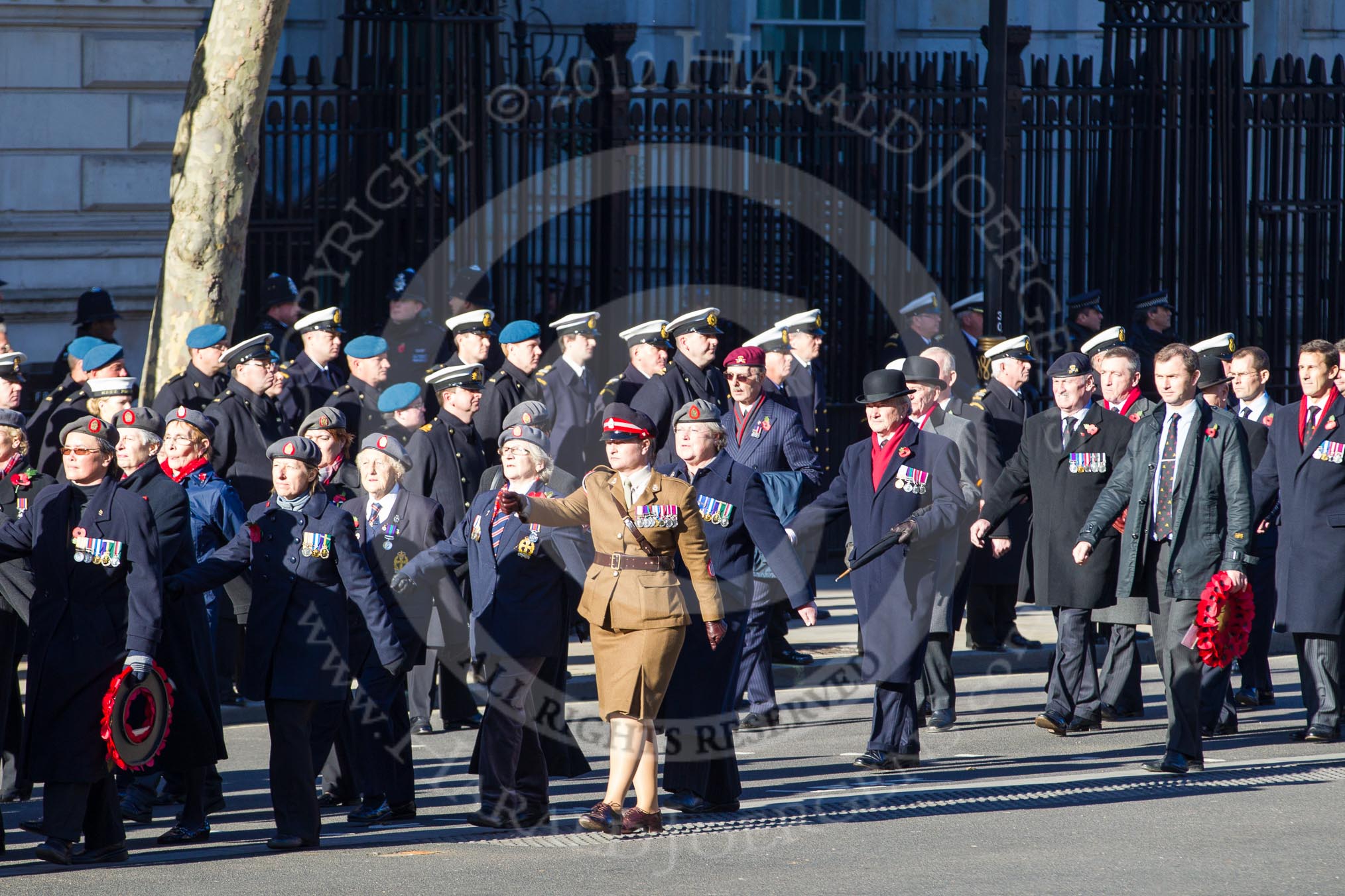 Remembrance Sunday 2012 Cenotaph March Past: Group B8 - Royal Army Physical Training Corps, B9 -Queen Alexandra's Royal Army Nursing Corps Association, and B10 - Royal Scots Dragoon Guards..
Whitehall, Cenotaph,
London SW1,

United Kingdom,
on 11 November 2012 at 11:55, image #855