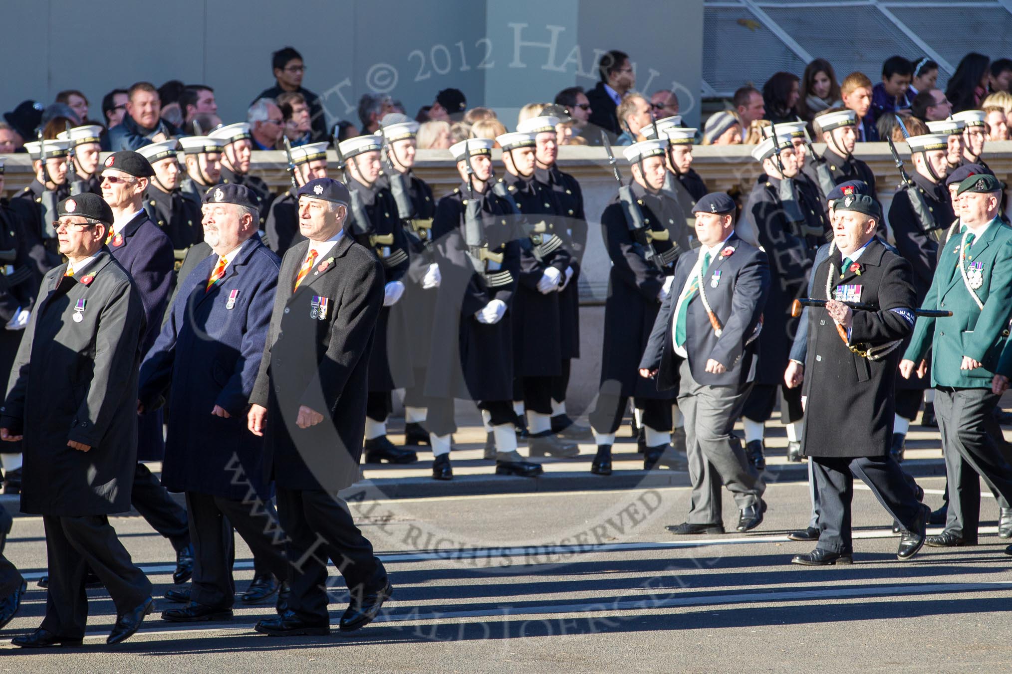 Remembrance Sunday 2012 Cenotaph March Past: Group B14 - JLR RAC Old Boys' Association and B15 - 43rd Reconnaissance Regiment Old Comrades Association..
Whitehall, Cenotaph,
London SW1,

United Kingdom,
on 11 November 2012 at 11:57, image #903