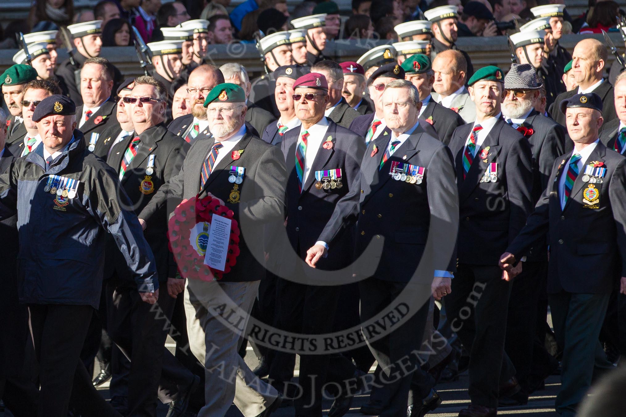 Remembrance Sunday 2012 Cenotaph March Past: Group D1 - South Atlantic Medal Association (www.sama82.org.uk), veterans of the Falklands war in 1982 and islanders from that time..
Whitehall, Cenotaph,
London SW1,

United Kingdom,
on 11 November 2012 at 12:04, image #1216