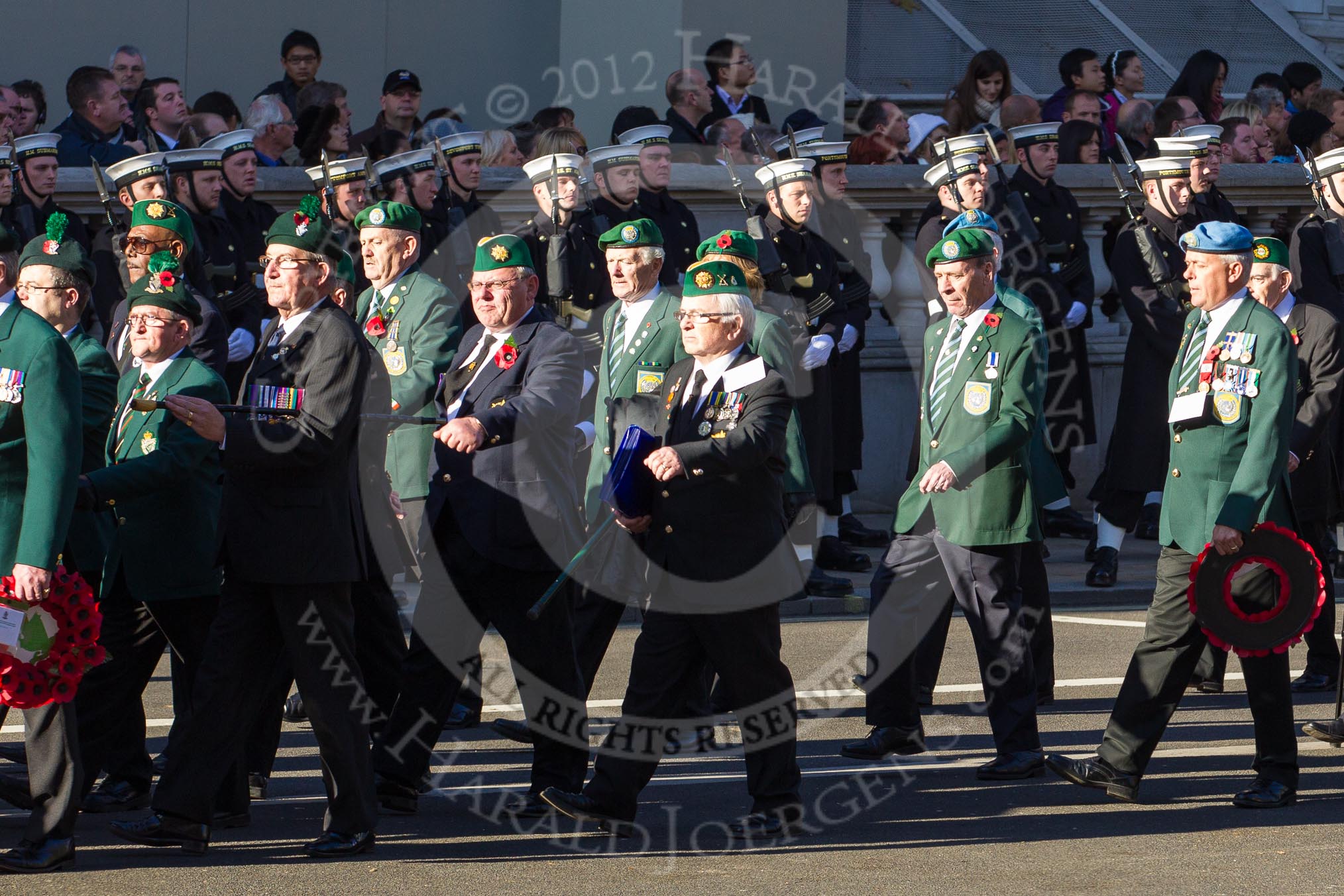 Remembrance Sunday 2012 Cenotaph March Past: Group D21 - Northern Ireland Veterans' Association, D22 - Irish United Nations Veterans Association, and D23 - ONET UK..
Whitehall, Cenotaph,
London SW1,

United Kingdom,
on 11 November 2012 at 12:08, image #1396