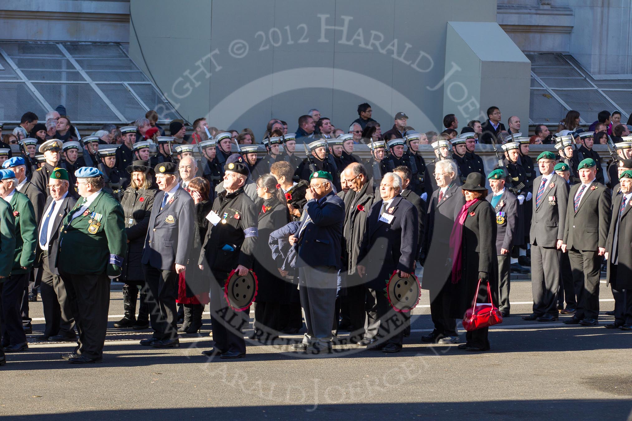 Remembrance Sunday 2012 Cenotaph March Past: Group D22 - Irish United Nations Veterans Association, D23 - ONET UK, and D24 - D24 - St Helena Government UK..
Whitehall, Cenotaph,
London SW1,

United Kingdom,
on 11 November 2012 at 12:08, image #1405