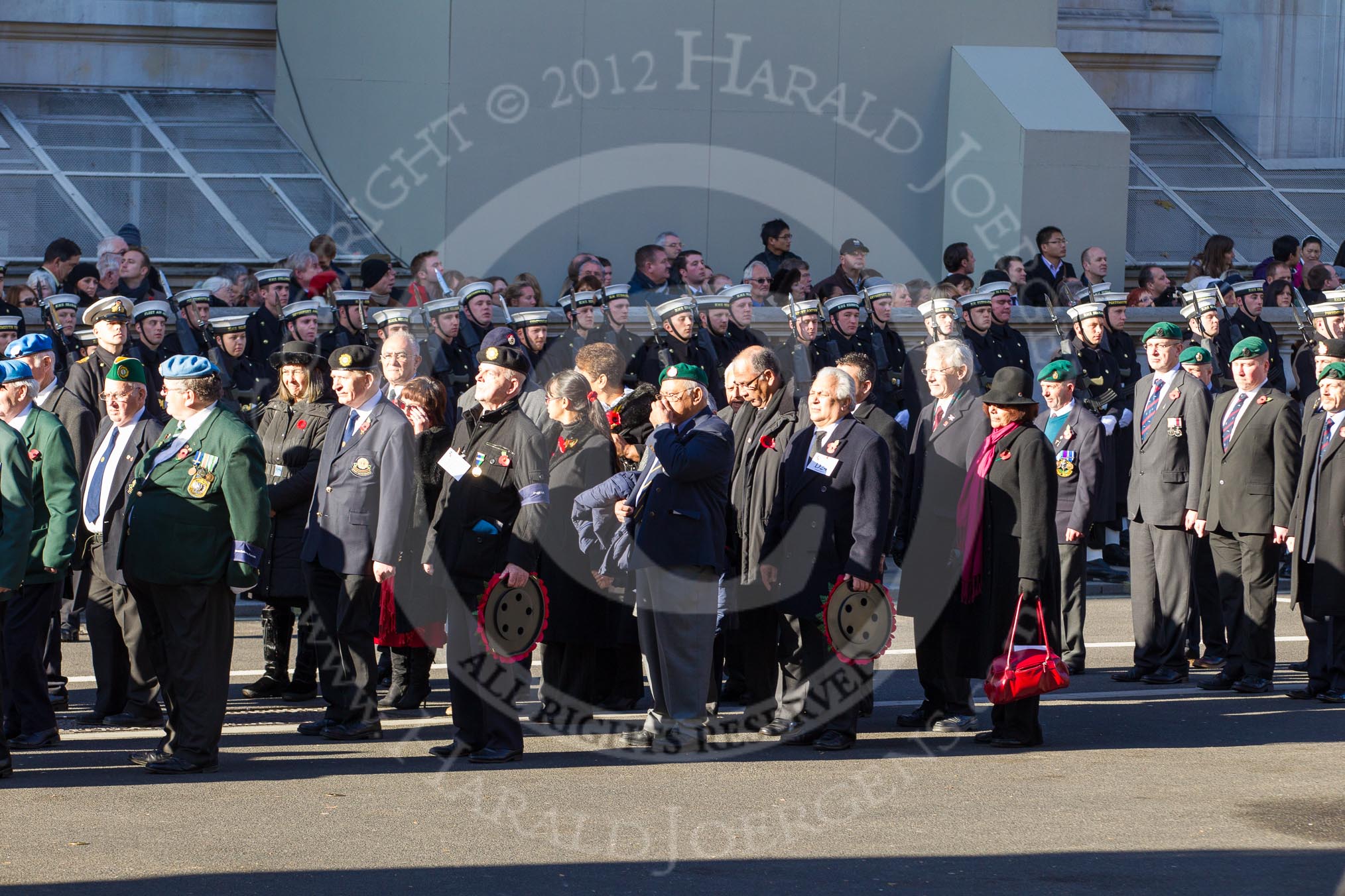 Remembrance Sunday 2012 Cenotaph March Past: Group D22 - Irish United Nations Veterans Association, D23 - ONET UK, and D24 - D24 - St Helena Government UK..
Whitehall, Cenotaph,
London SW1,

United Kingdom,
on 11 November 2012 at 12:08, image #1405